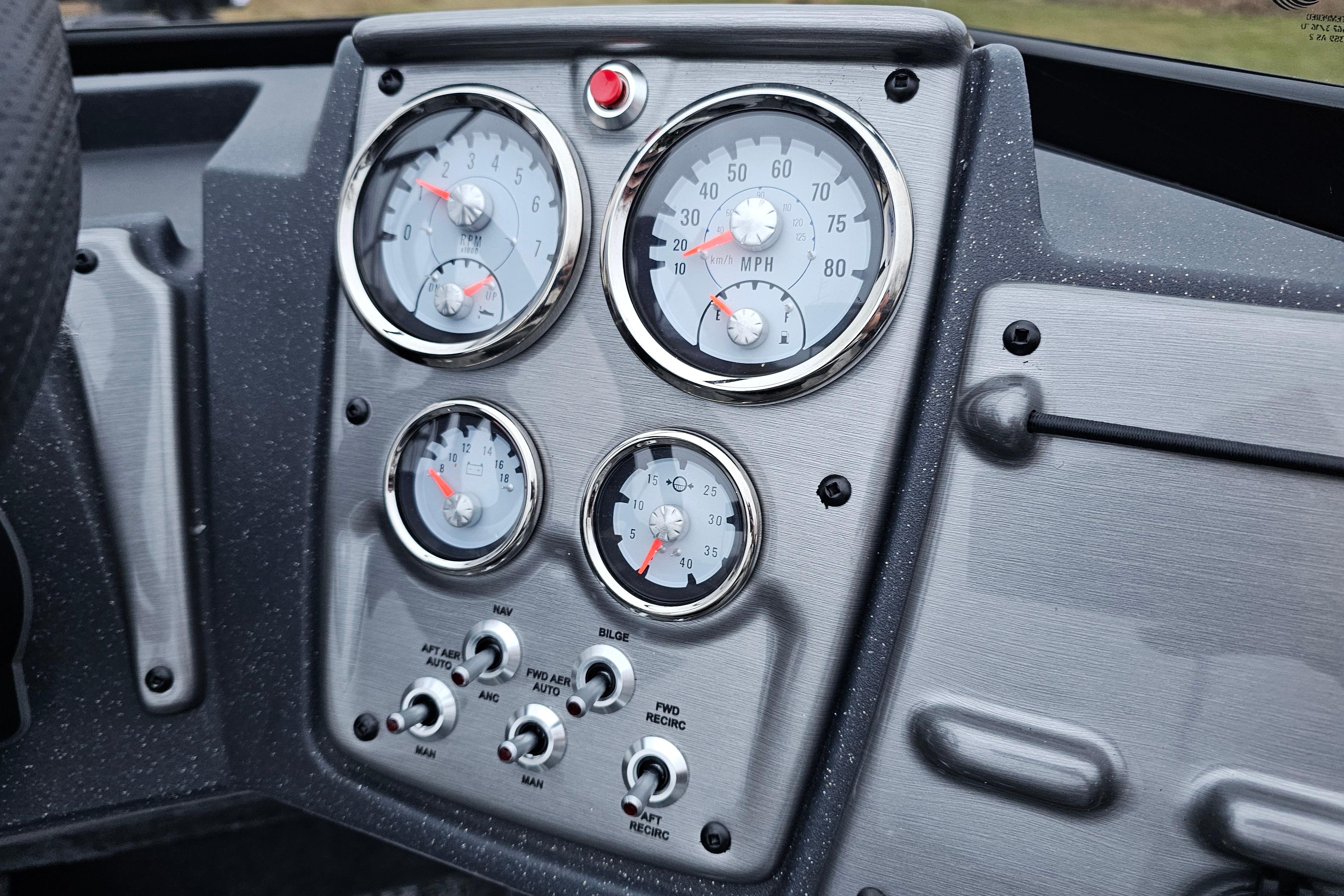 Dashboard of 2026 Tracker Pro Guide V-175 WT boat with gauges and controls.