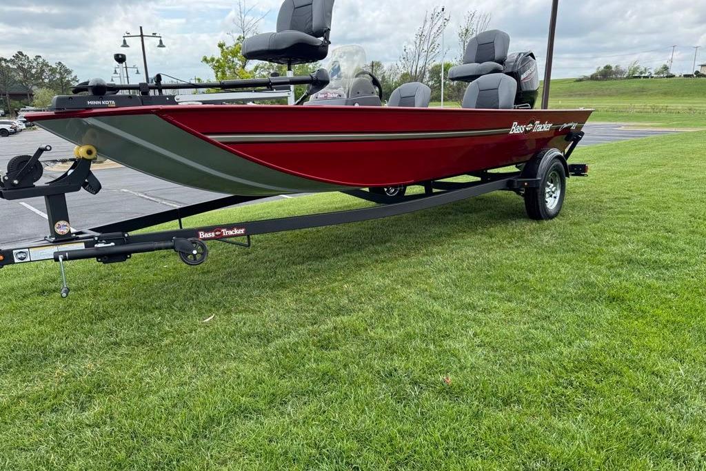 2026 Tracker Bass Tracker Classic XL boat on trailer, parked on grass.