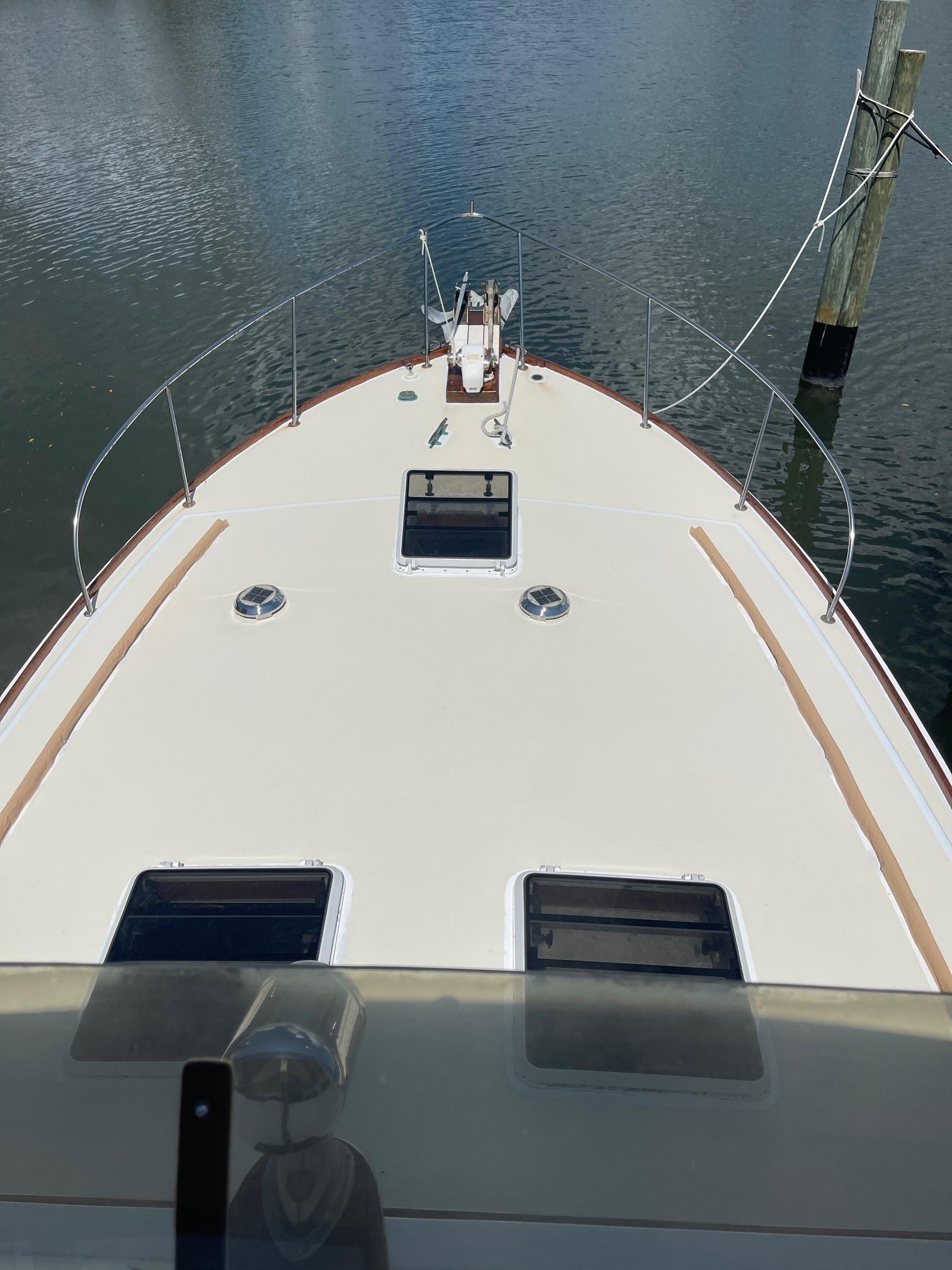 1979 Jarvis Newman Trawler boat deck view on calm water.