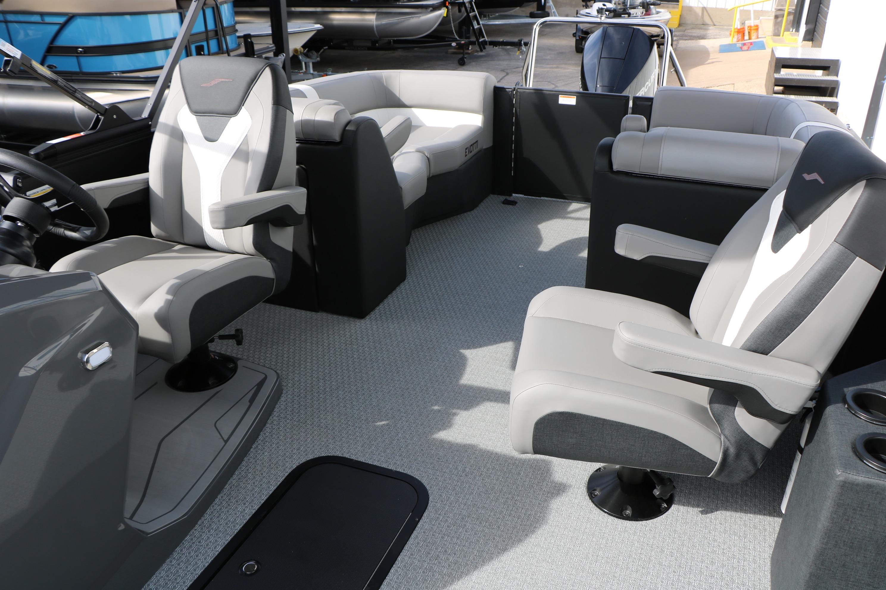 Interior of 2026 Evotti 521QL boat with modern seating and steering area.