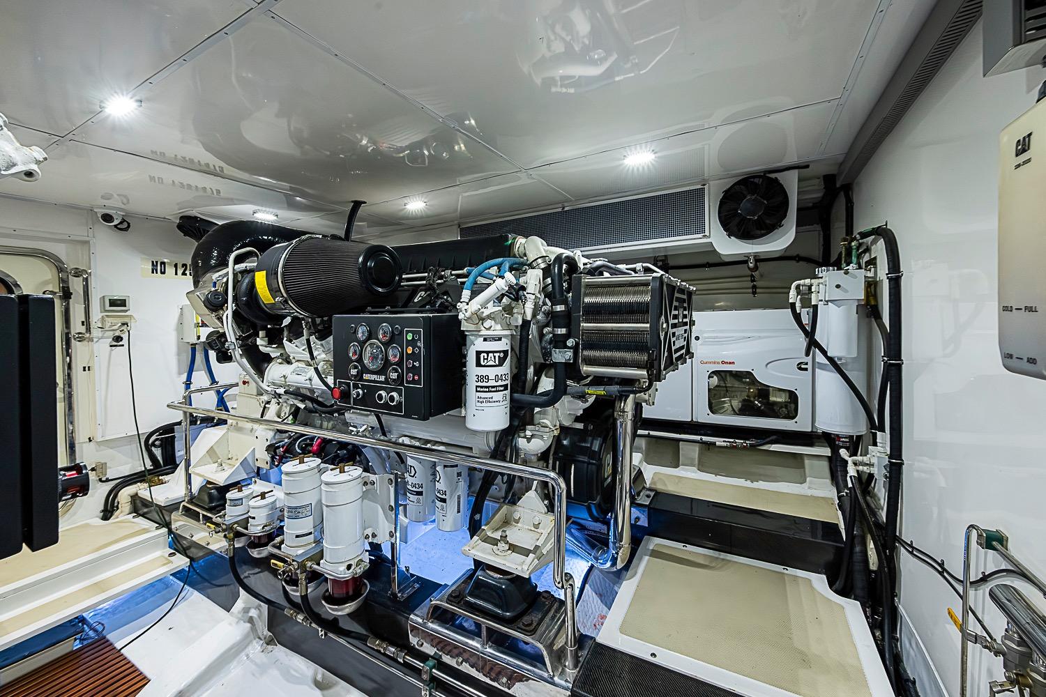 Engine room of 2014 Marlow 80 Explorer yacht, featuring advanced machinery and equipment.