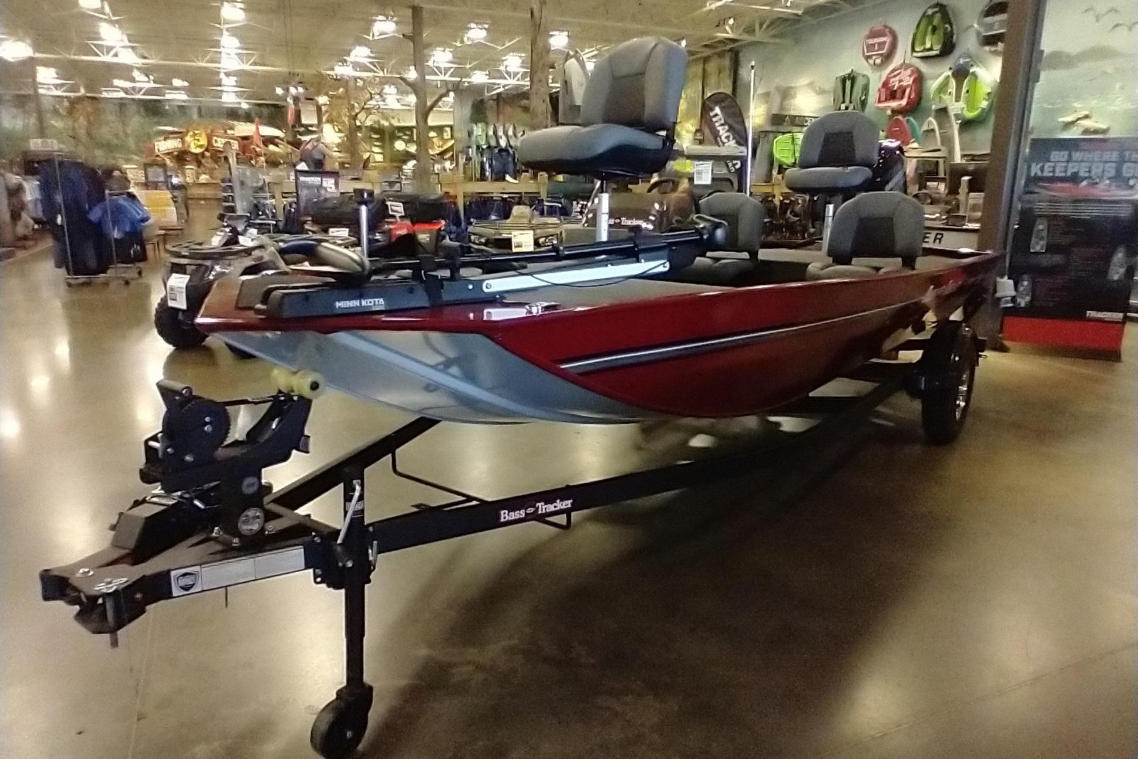 2026 Tracker Bass Tracker Classic XL boat displayed in a showroom setting.