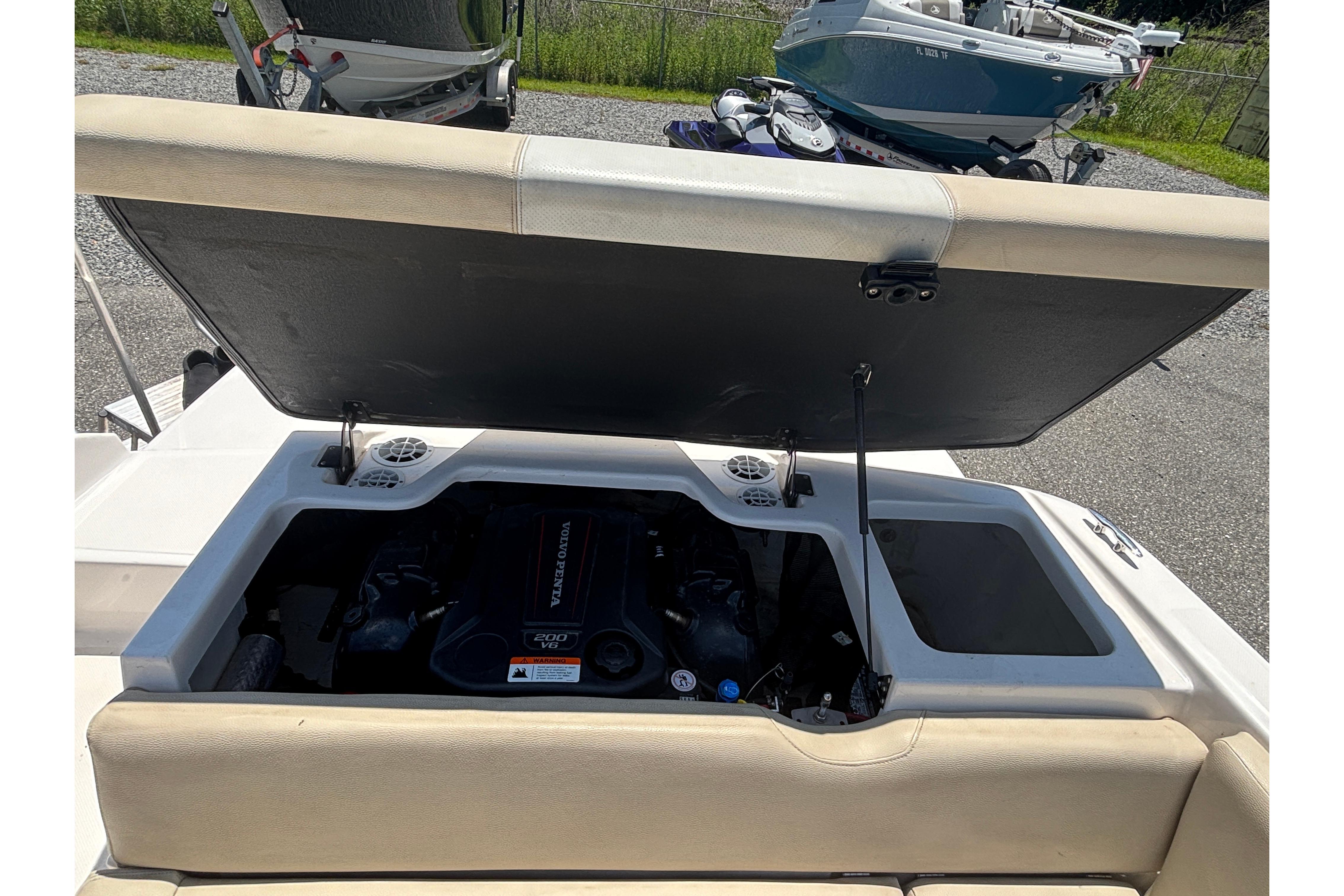 2018 Regal 1900 ES Bowrider engine compartment open, showcasing Volvo Penta 200 V6 engine.