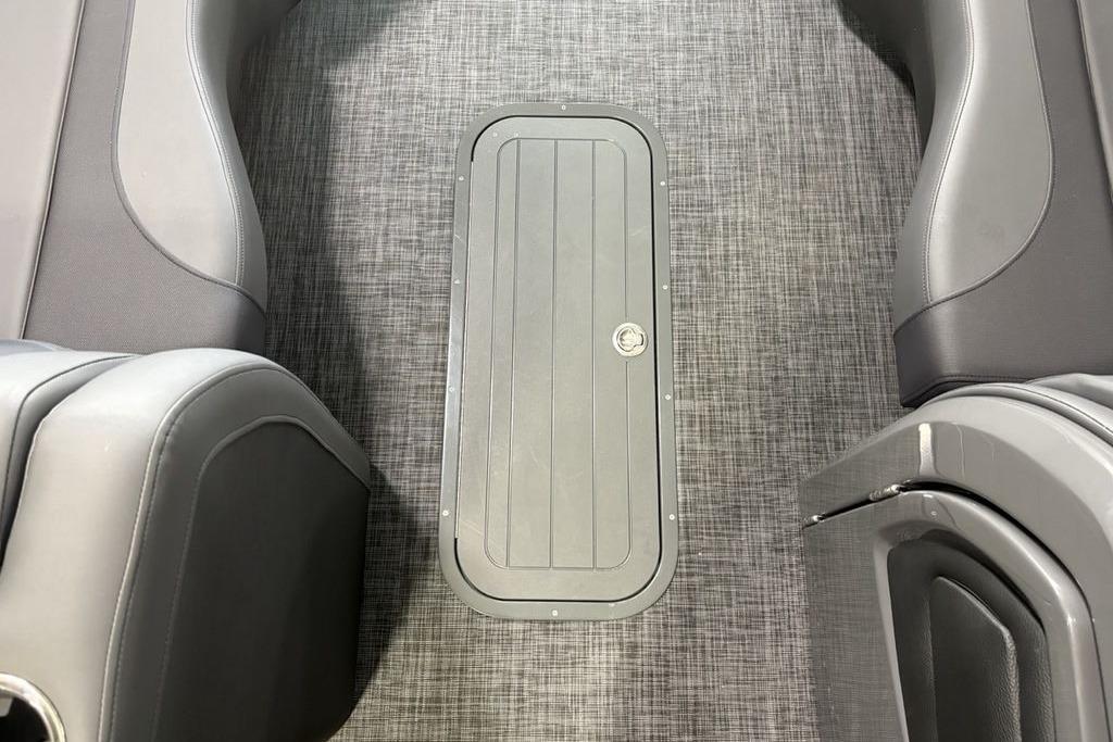 Interior view of 2026 Godfrey Monaco 235 SFLC iMPACT 2.0 Package, featuring sleek seating and flooring.