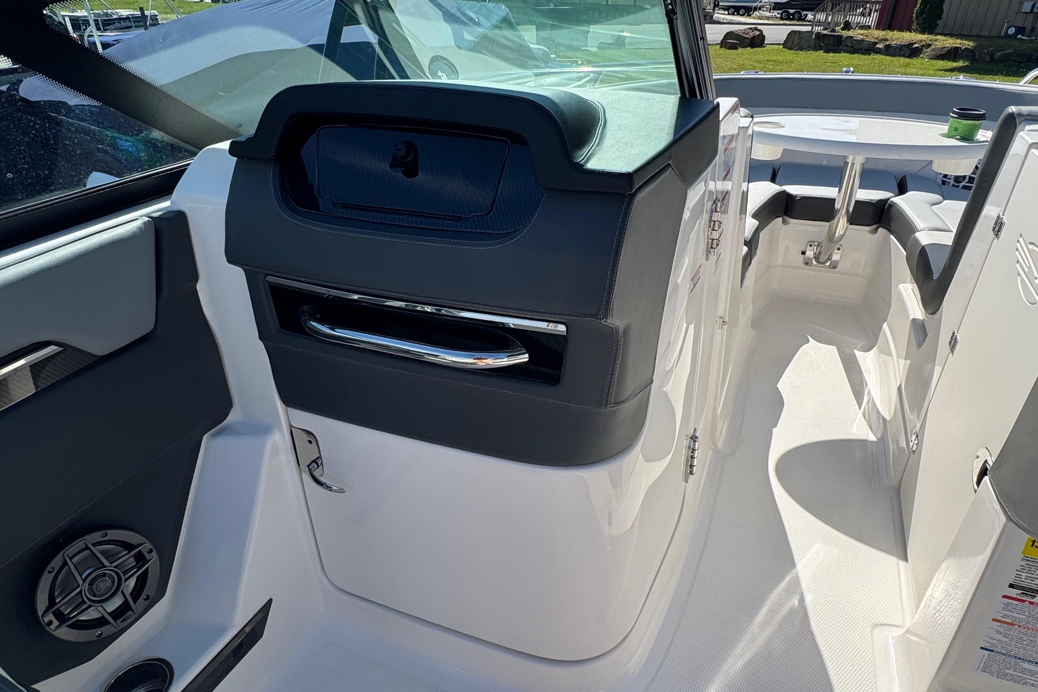 Interior view of 2026 Chaparral SSX 4 boat, featuring sleek design and modern amenities.