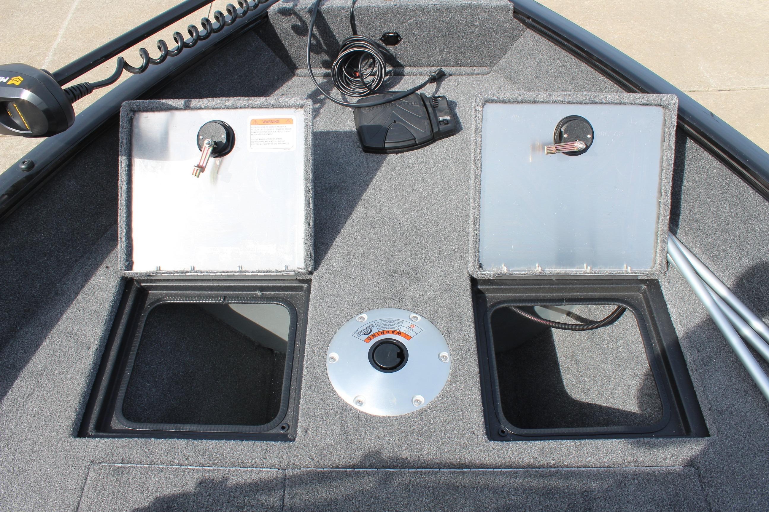 2026 Tracker Pro Guide V-16 WT boat storage compartments and control panel.