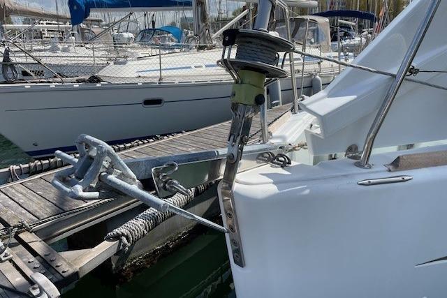 Bow of 2011 Jeanneau Sun Odyssey 33i yacht docked at marina.