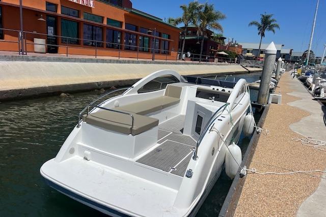 2024 Bracewell 25 boat docked at marina, featuring sleek design and modern amenities.