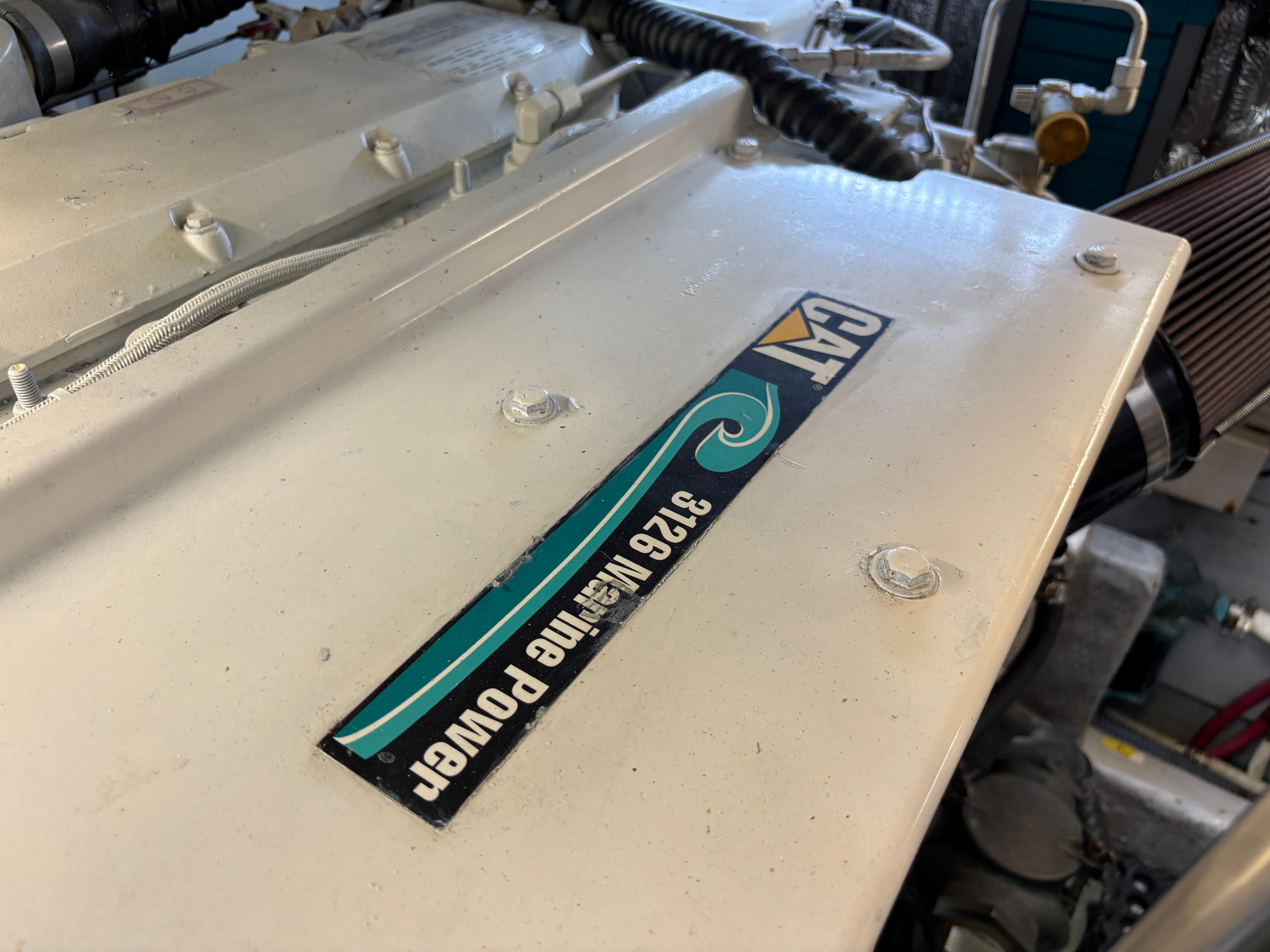 Engine of 2001 Silverton 410 Sport Bridge with CAT 3126 Marine Power.