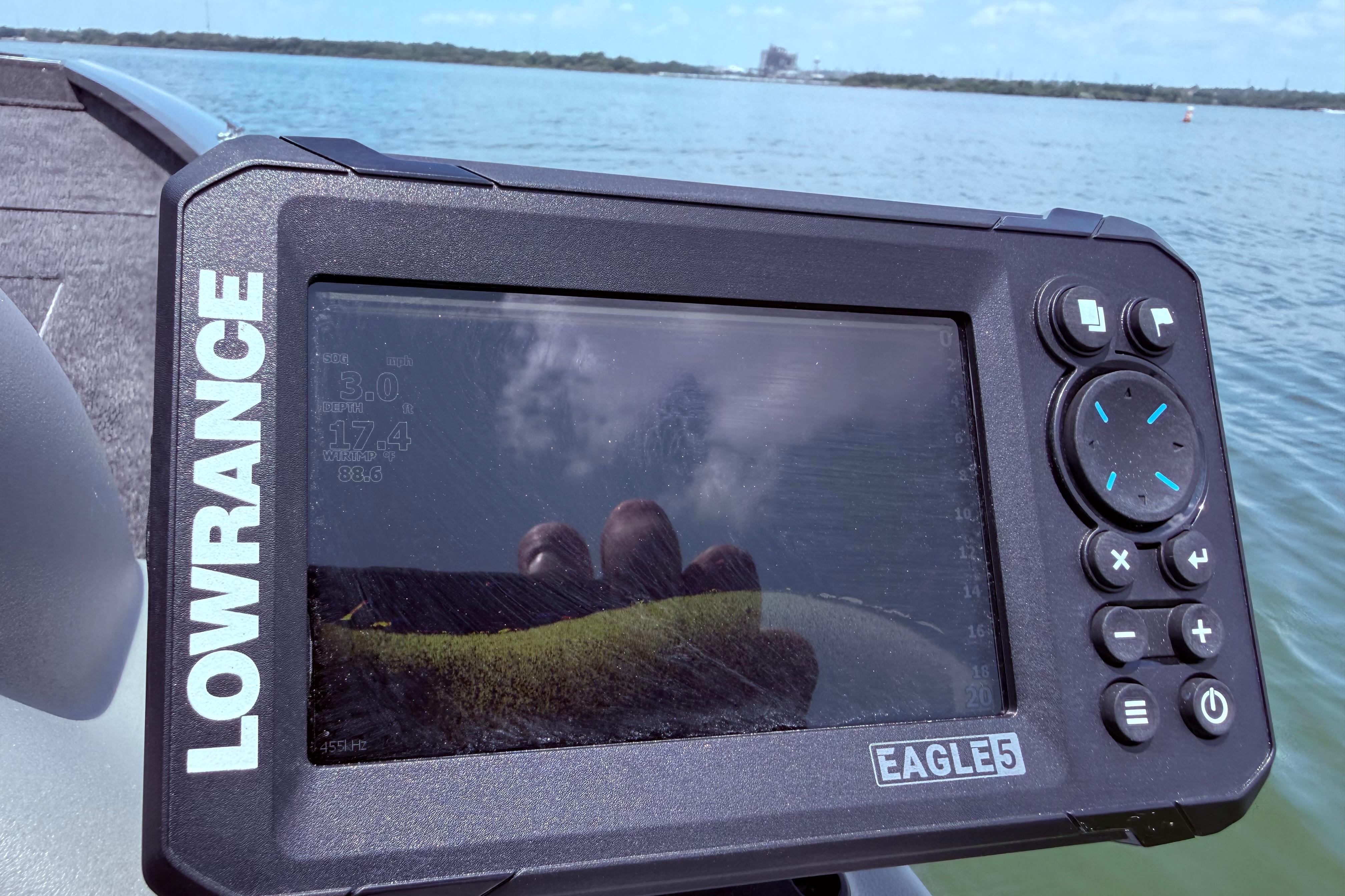 Lowrance Eagle 5 fishfinder on 2015 Tracker Pro Team 190 TX boat, lake view.