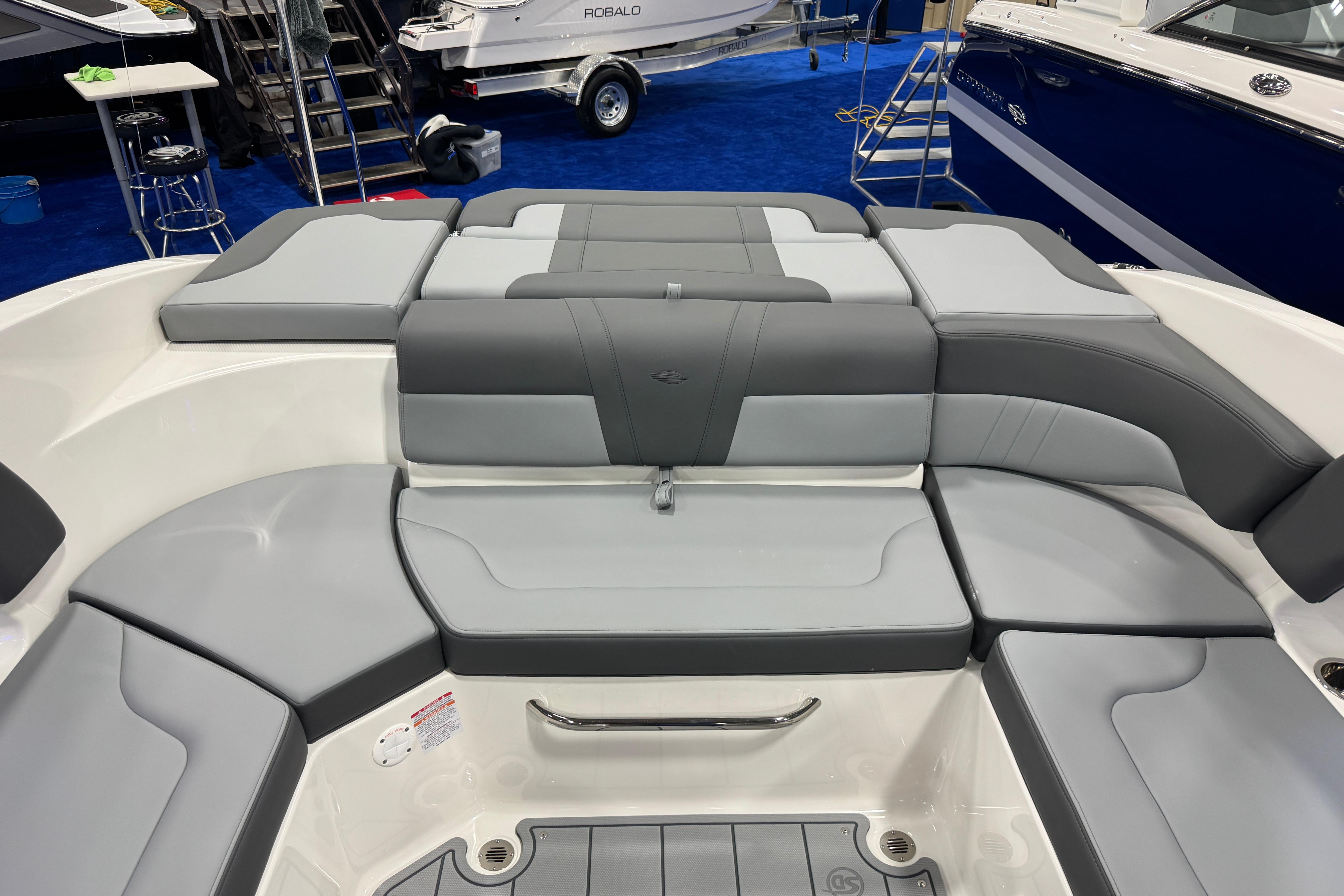 2026 Chaparral 23 SSi boat interior with gray seating and modern design.