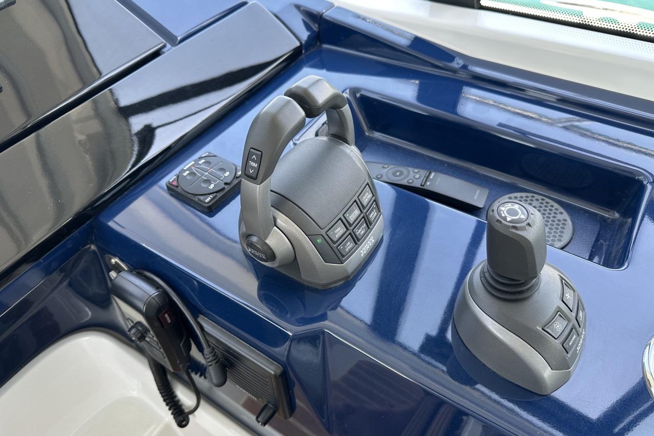 Control panel of 2022 Beneteau Gran Turismo 45 yacht, featuring joystick and throttle controls.