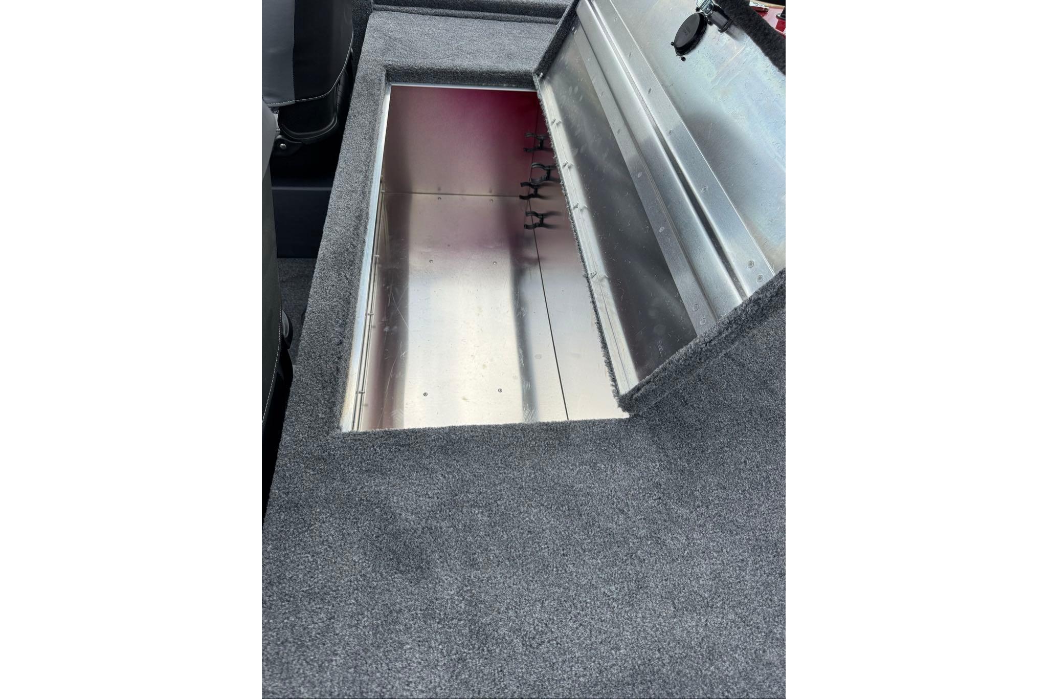 Open storage compartment in 2026 Tracker Bass Tracker Classic XL boat.