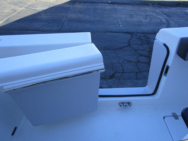 2025 Sea Pro 292 Offshore boat interior detail with seating and storage.