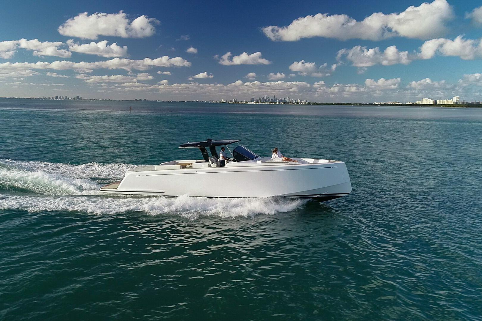 2025 Pardo Yachts 50 cruising on open water under a clear blue sky.