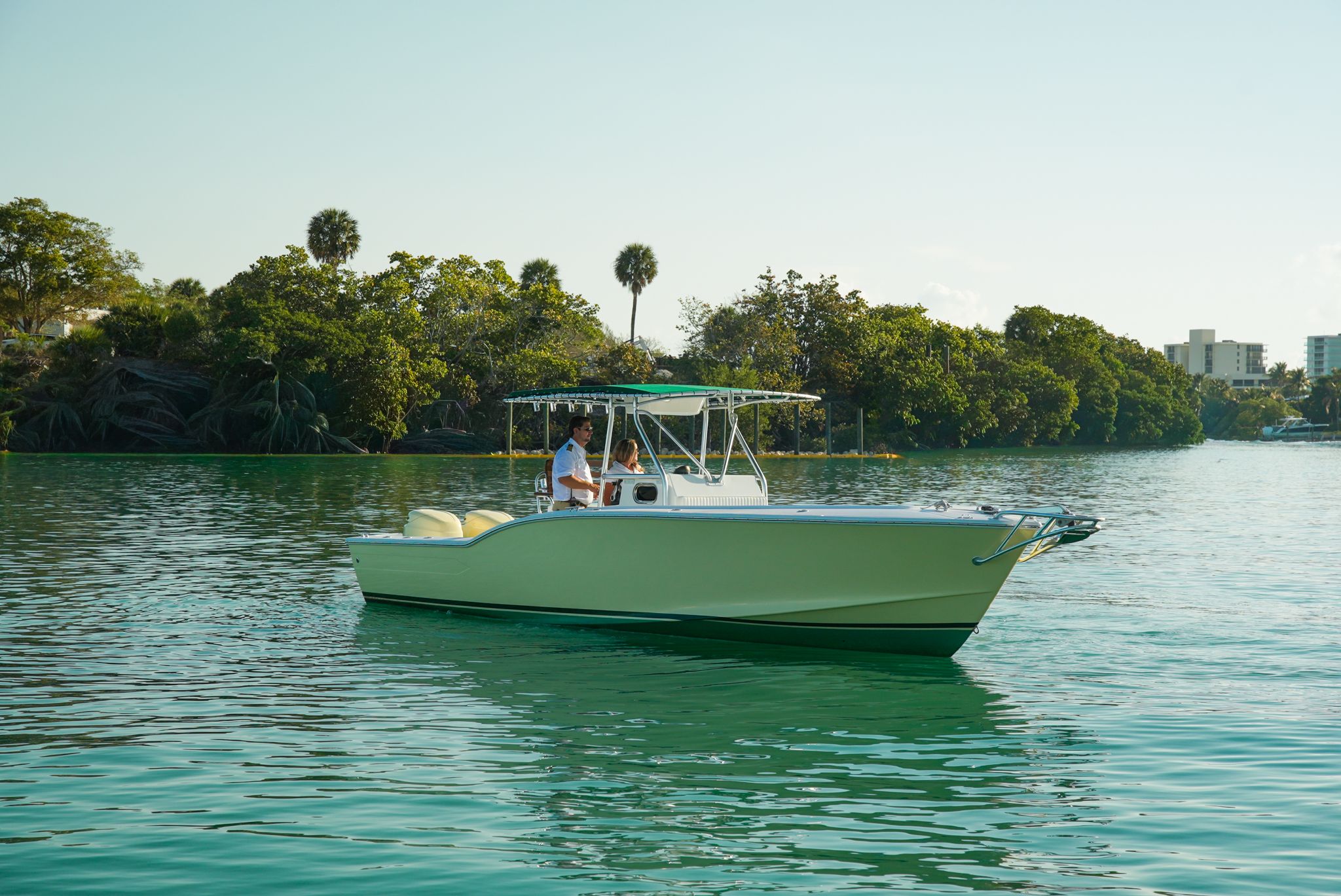 1985 Ocean Master 28 boat cruising on calm waters.