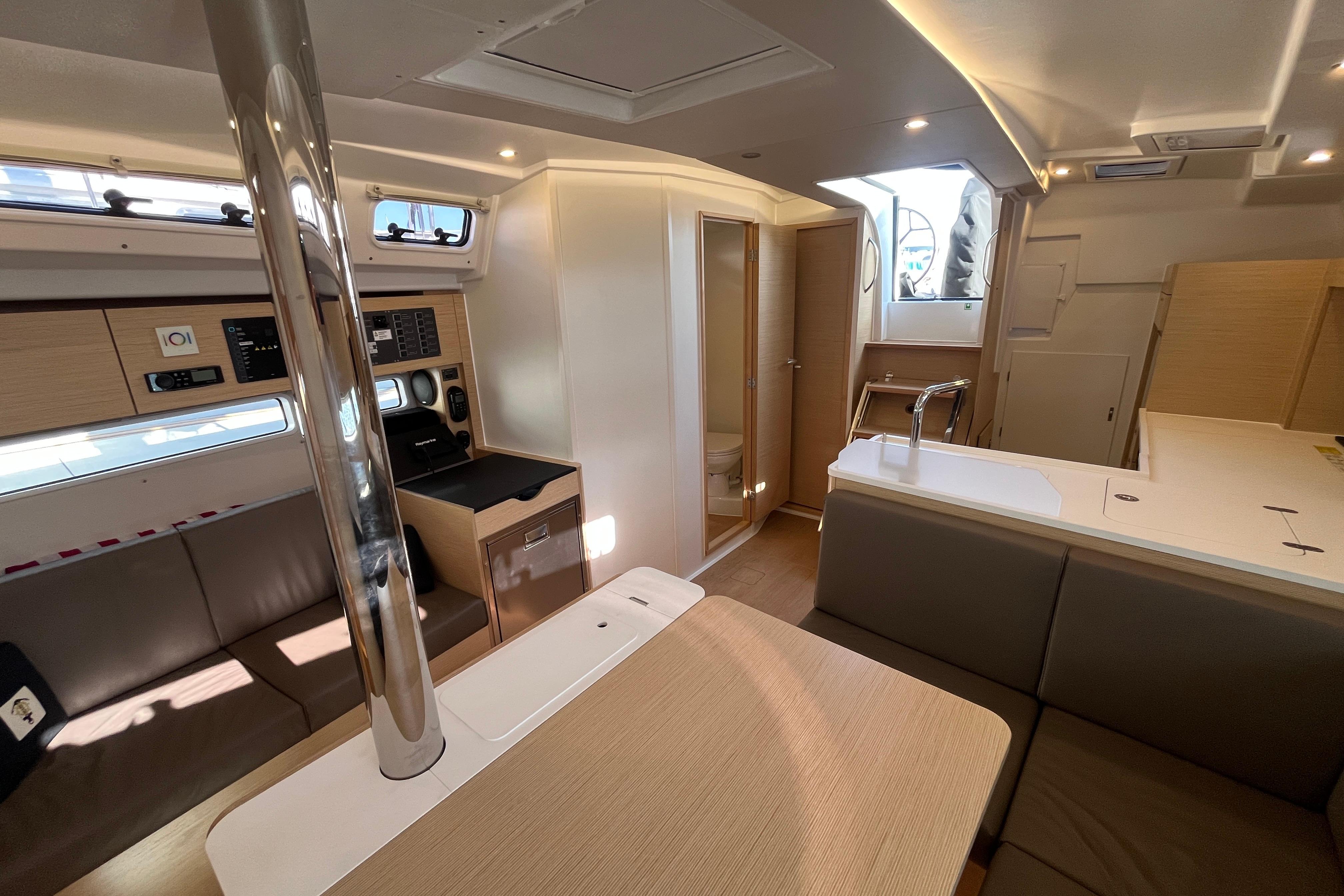 Modern interior of 2025 Hanse 360 yacht with sleek design and comfortable seating.