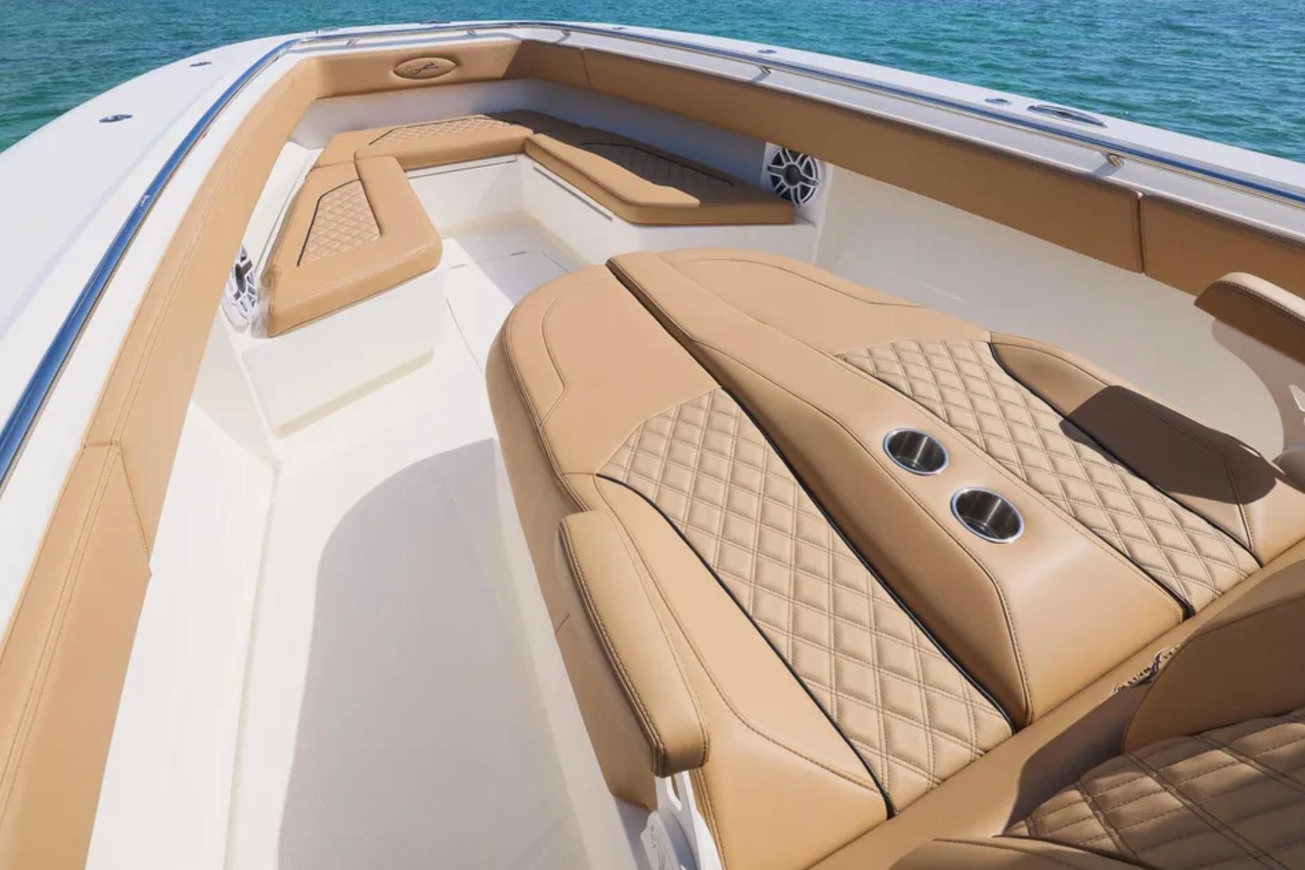 Luxurious seating on 2025 Blackwater 41 Performance Fish boat, featuring tan quilted upholstery.