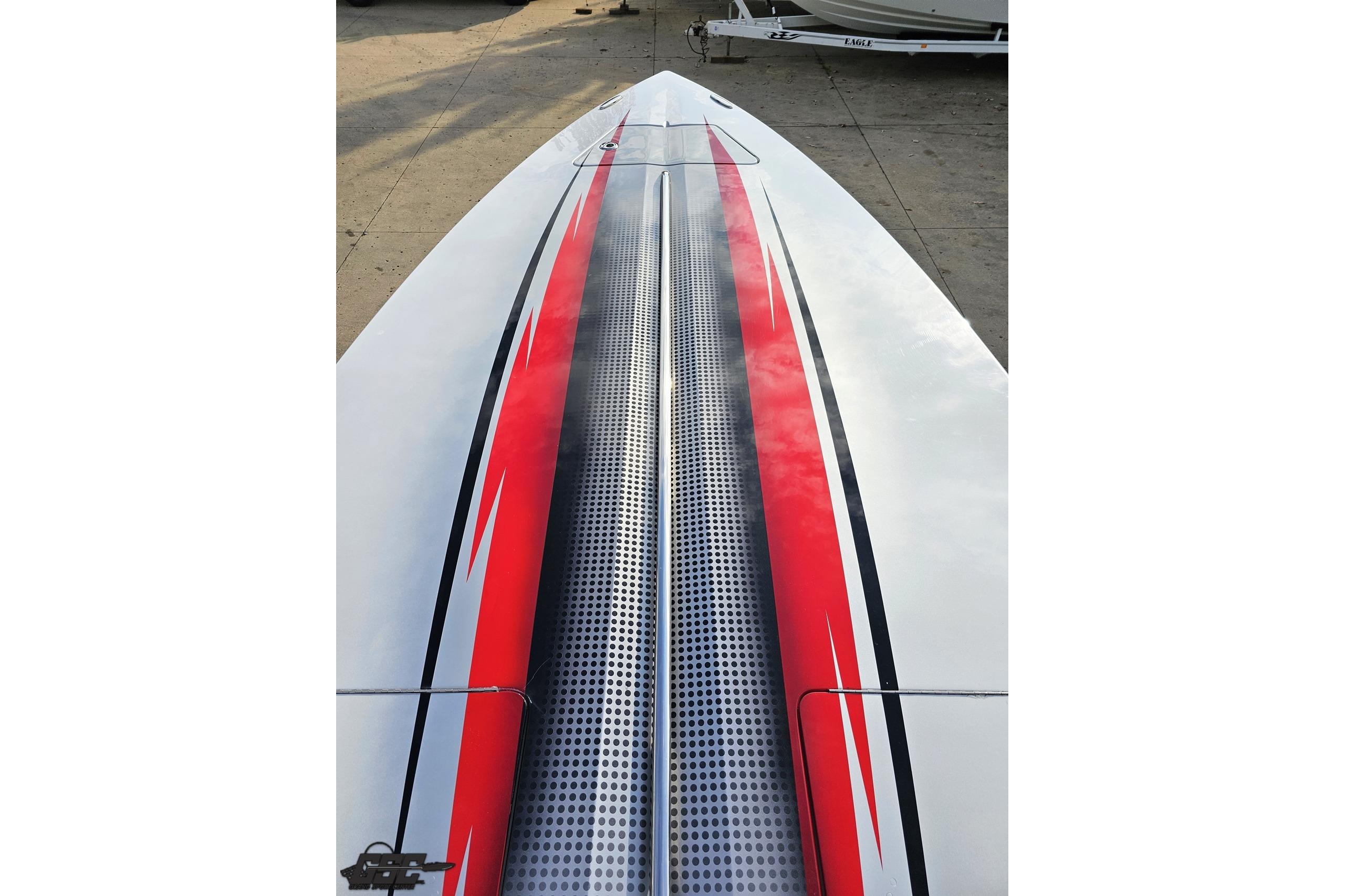 2008 Donzi 38 ZR boat deck with red and black racing stripes.