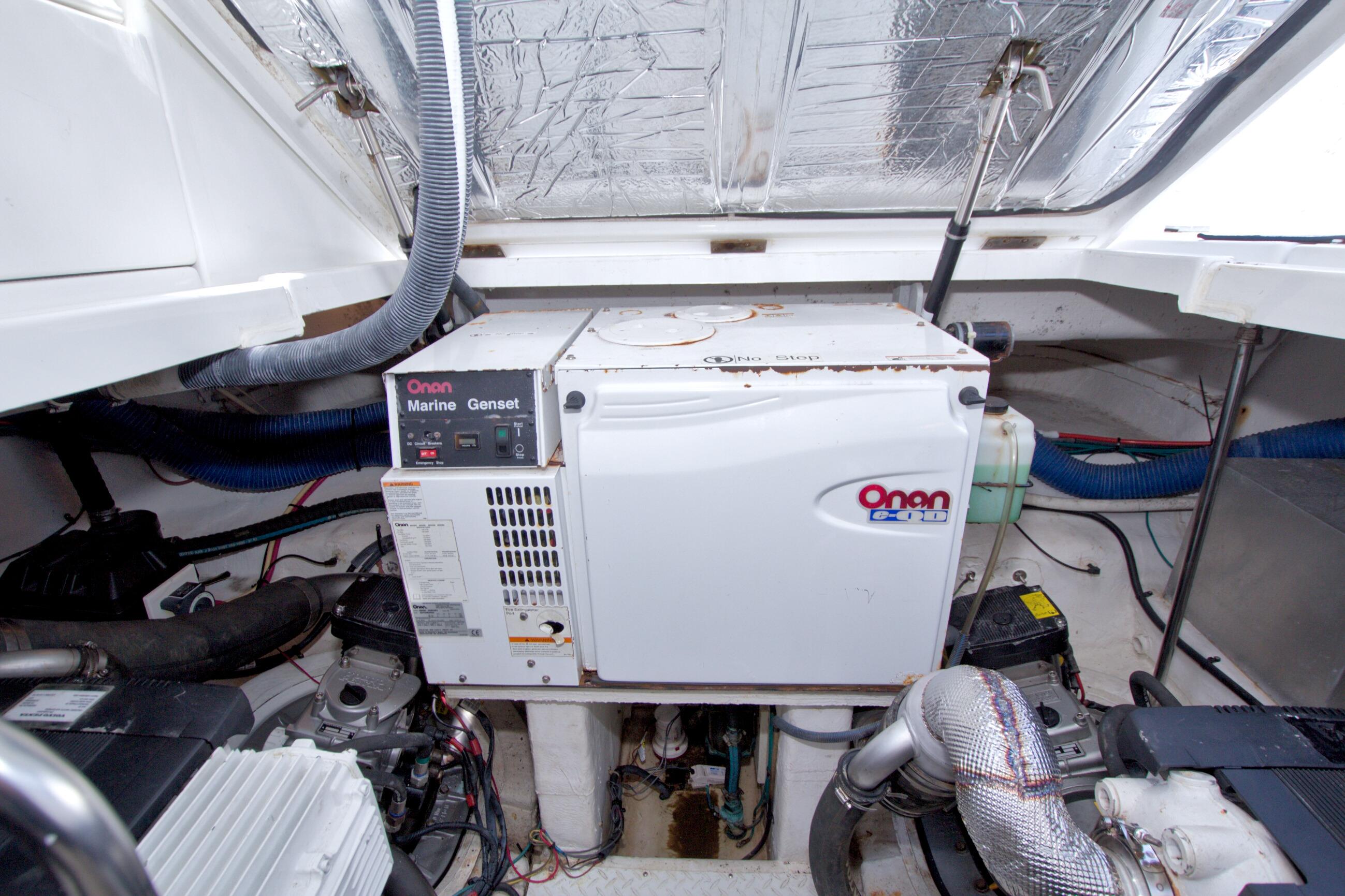 Engine room of 2008 Cruisers Yachts 420 Express with Onan Marine generator.
