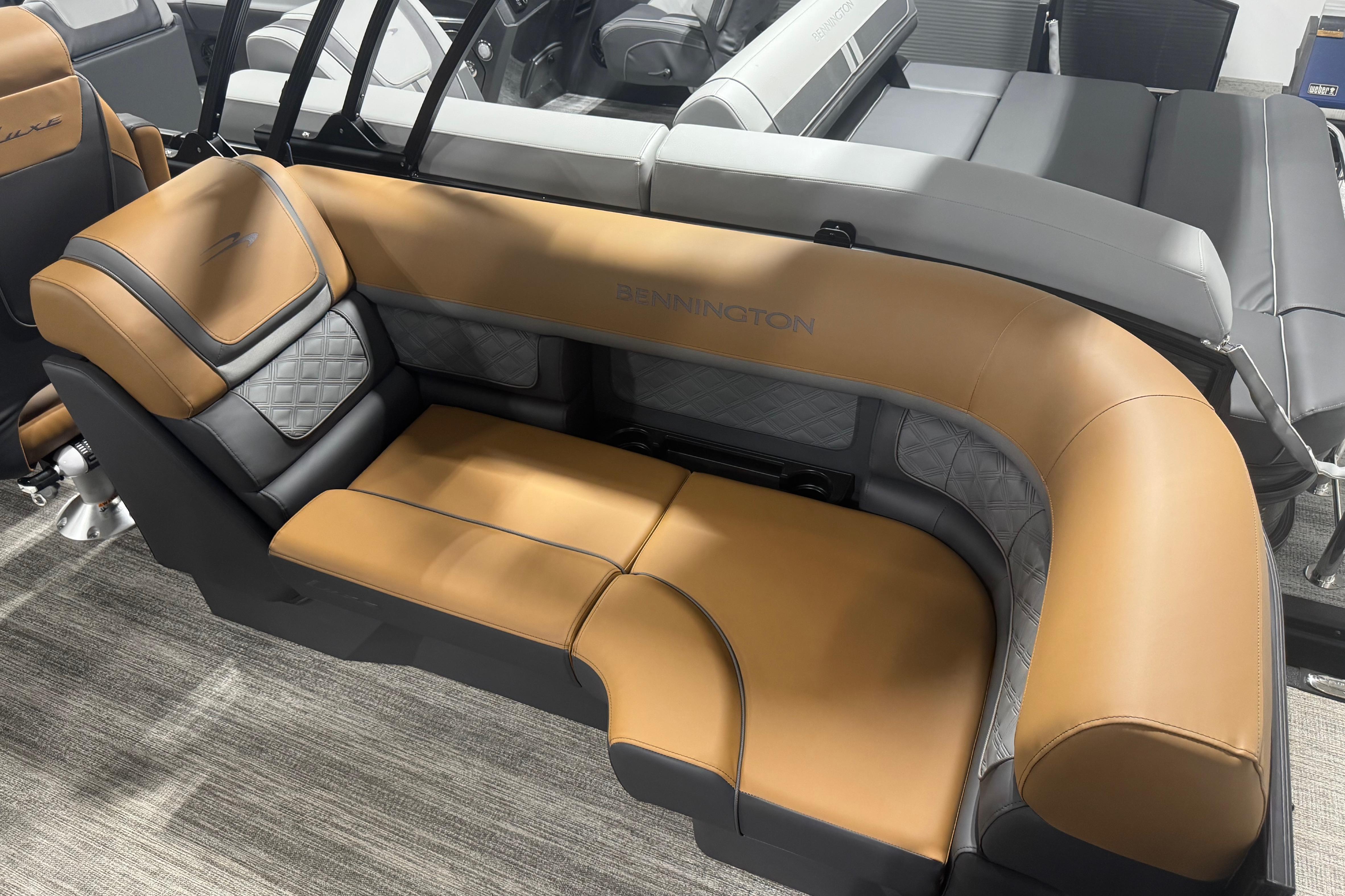 2026 Bennington 22 SSR Luxe boat interior with luxurious tan and gray seating.