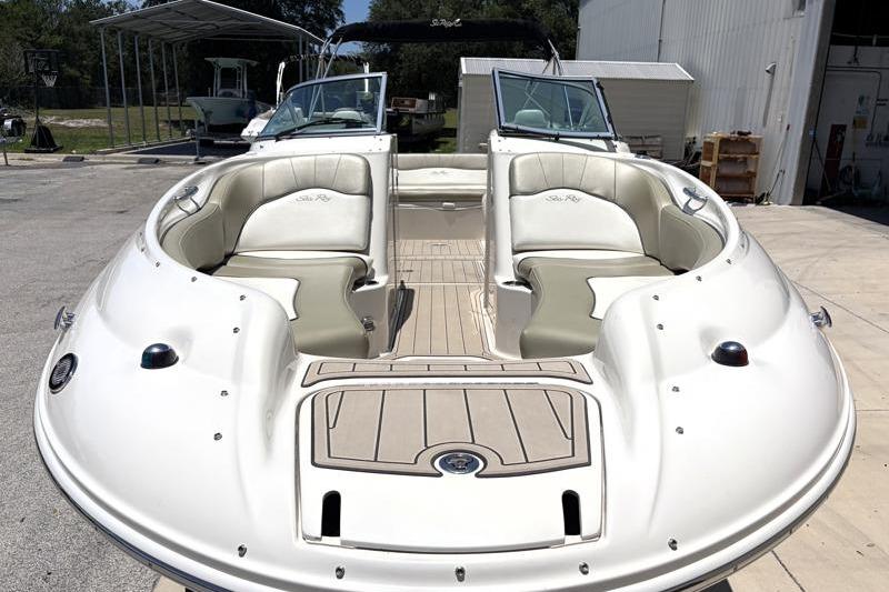 2007 Sea Ray 240 Sundeck boat with spacious seating and sleek design.