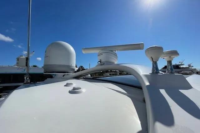 2016 Sea Ray Sundancer 510 yacht radar and navigation equipment under clear blue sky.