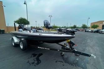 2026 Ranger Z518 Cup-Equipped boat on trailer in parking lot.