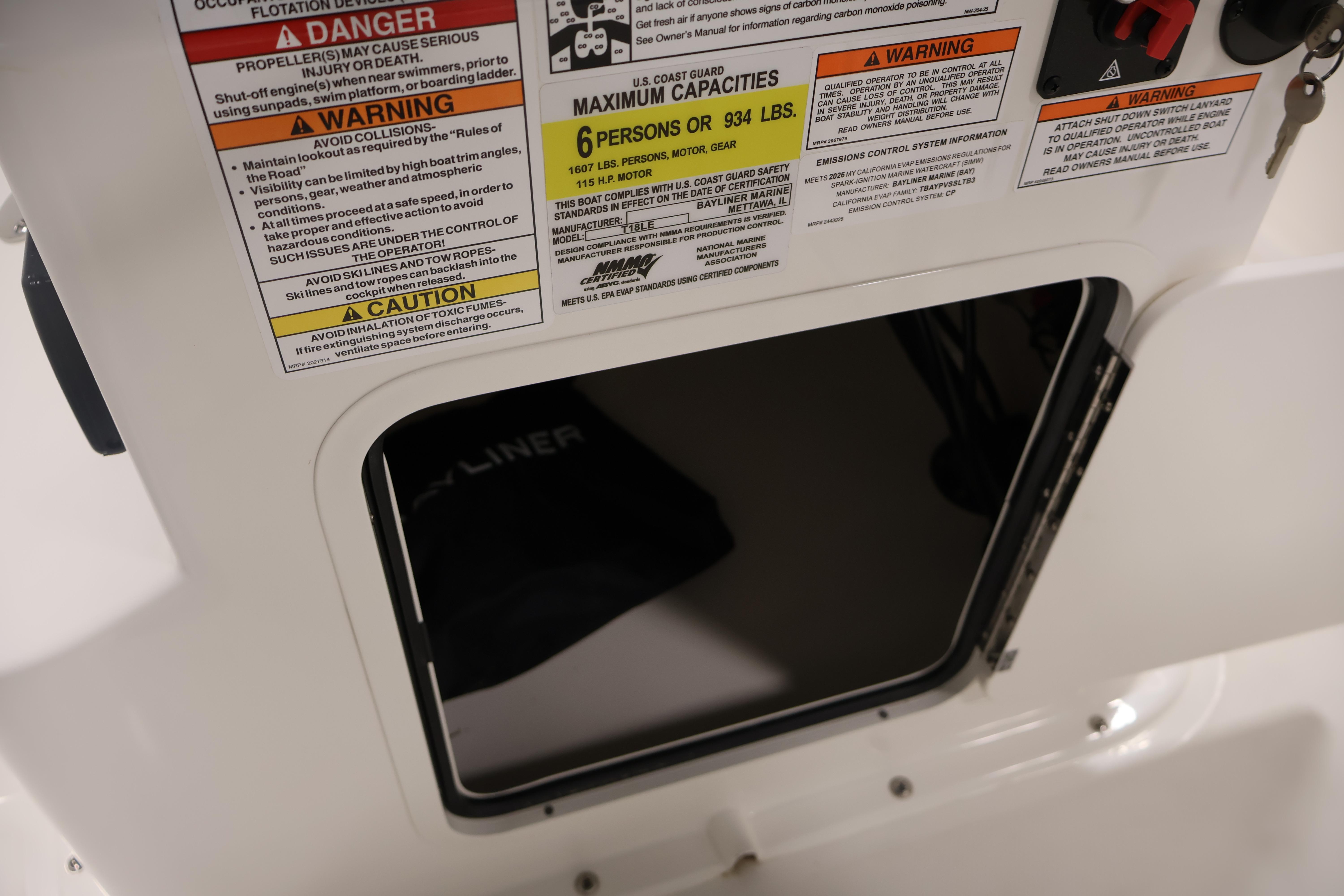 2026 Bayliner Trophy T18 boat warning labels and capacity information.