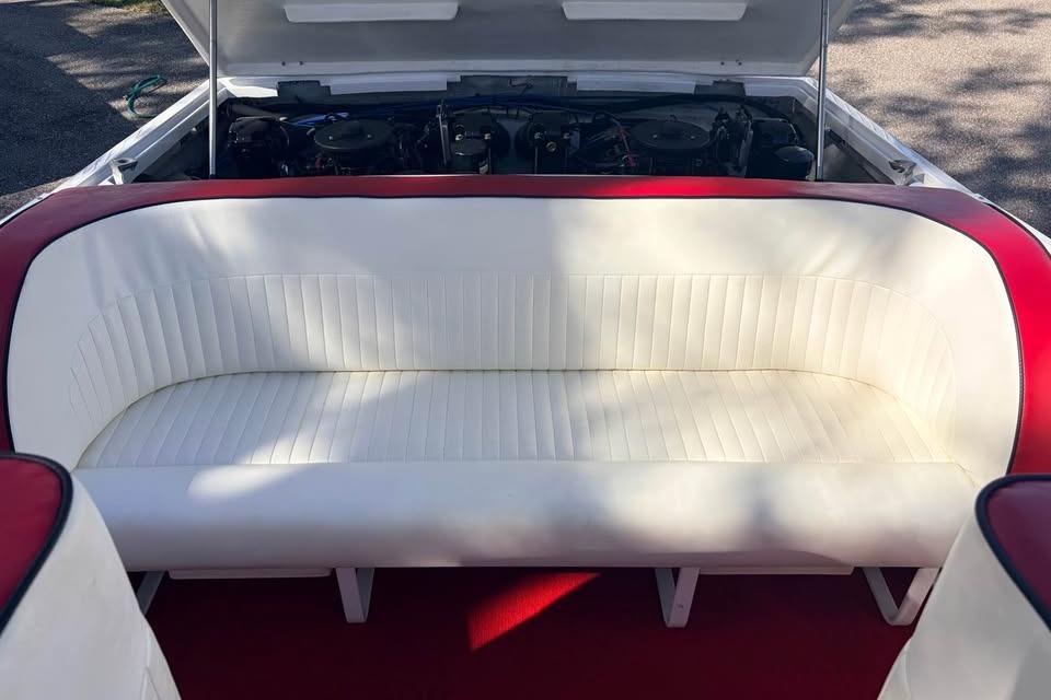 1983 Cigarette 24' Classic boat interior with white and red seating.