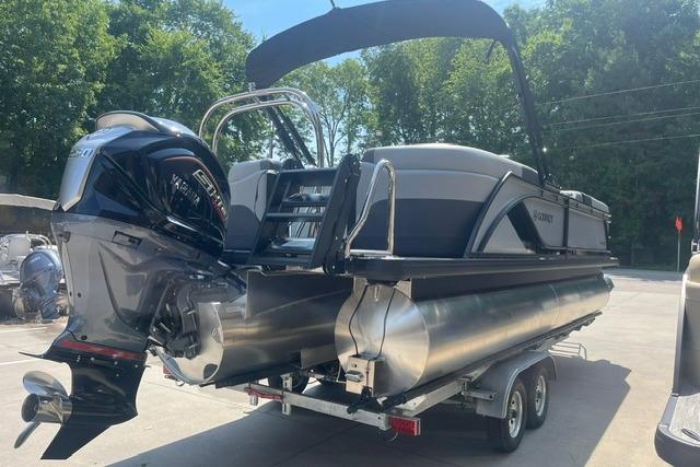 2026 Godfrey Sweetwater 2286 SBC pontoon boat on trailer, featuring powerful outboard motor.