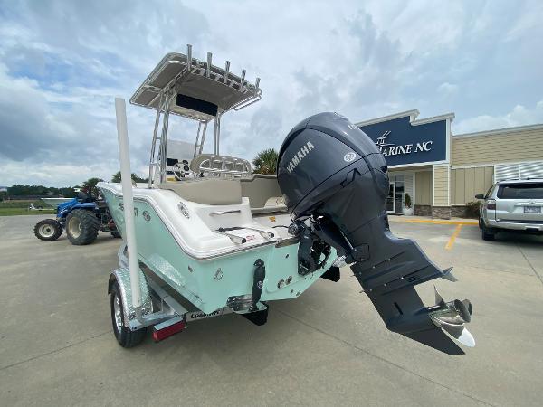 2024 Key West 203 FS boat with Yamaha outboard motor at dealership.