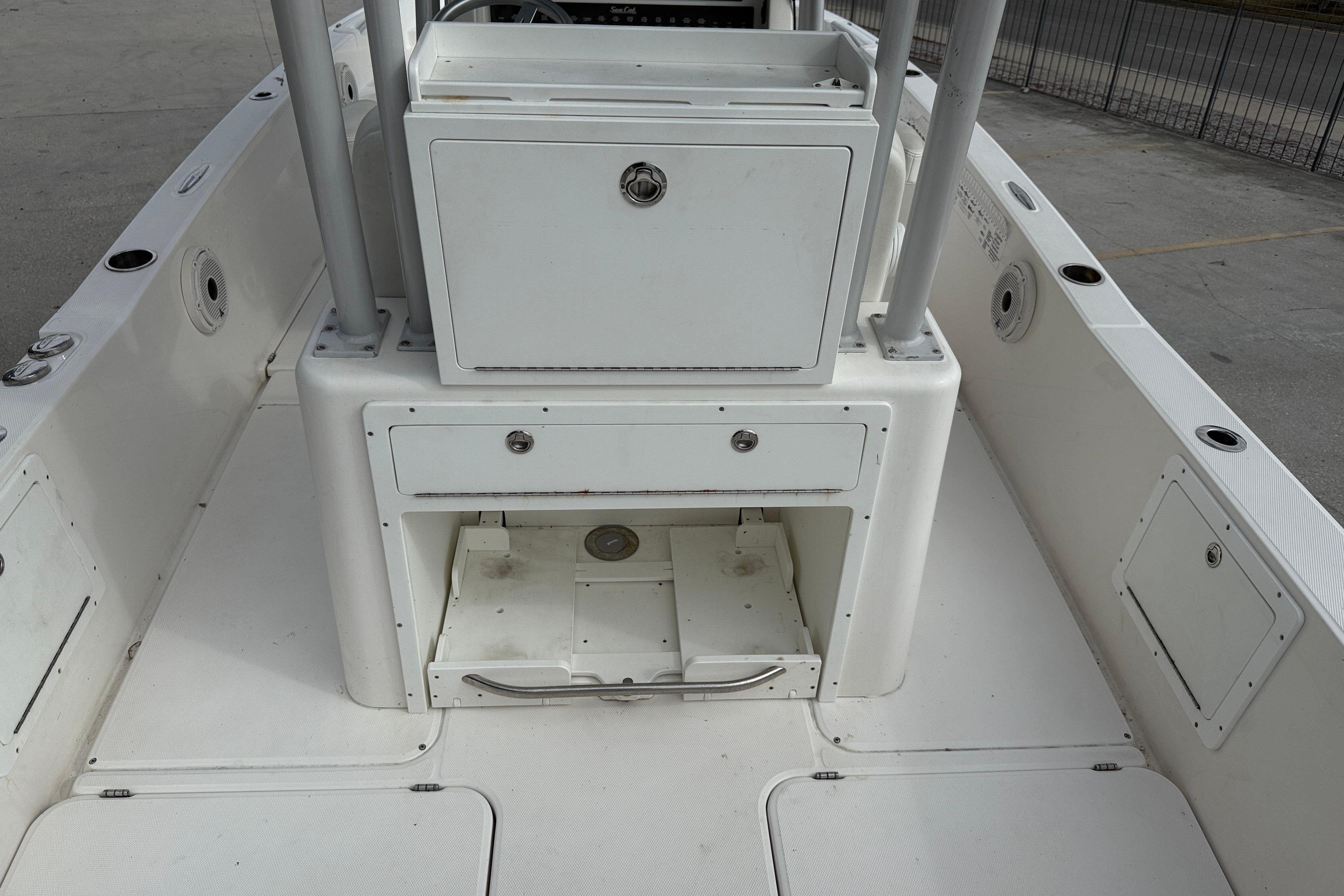 2021 Sea Cat 260 boat interior with storage compartments and clean white deck.