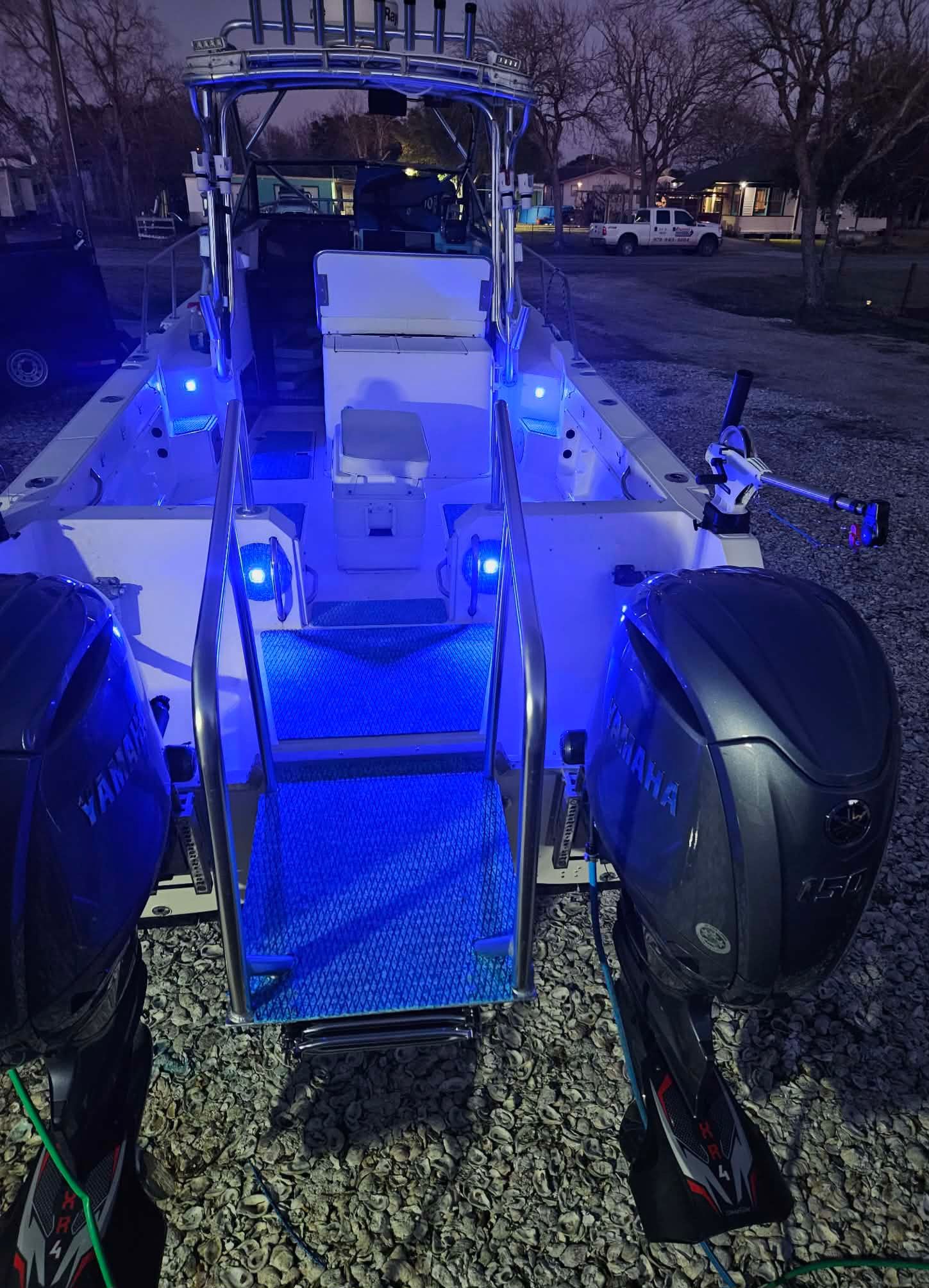 1997 Sea Cat SLC 5 boat with blue LED lighting and Yamaha engines.