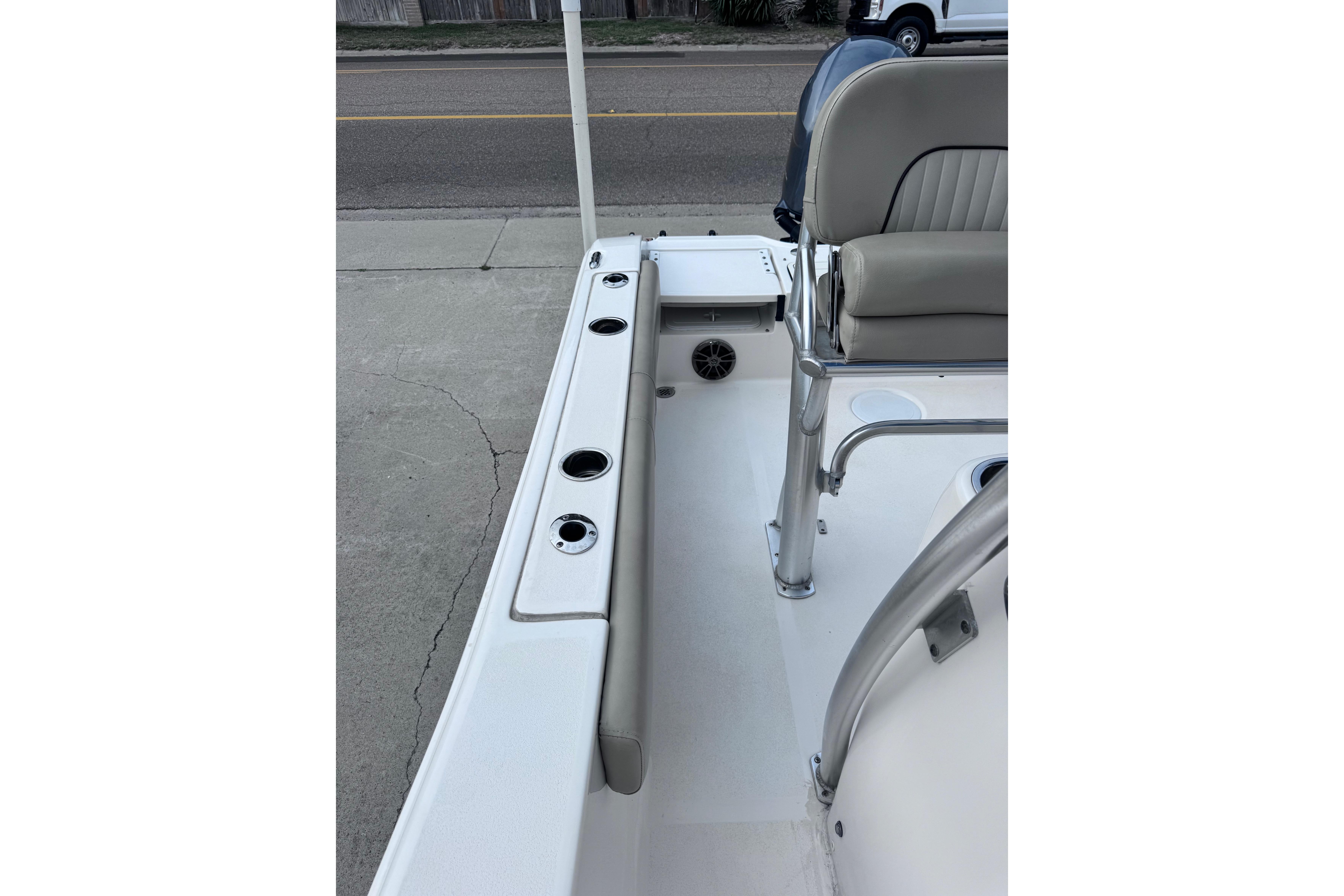 2018 Sea Fox 206 Commander boat interior with seating and rod holders.