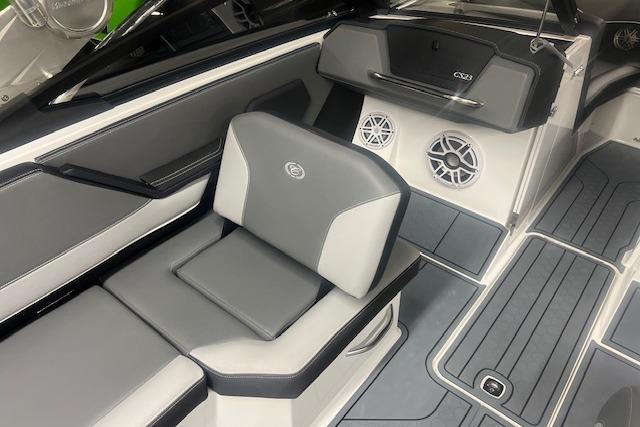 2025 Cobalt CS23 Surf boat interior with gray seating and modern design features.