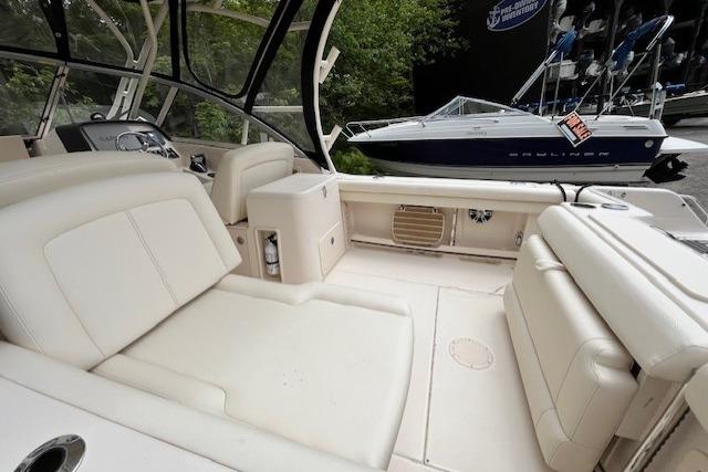 2022 Grady-White Freedom 255 boat interior with white seating and dashboard.