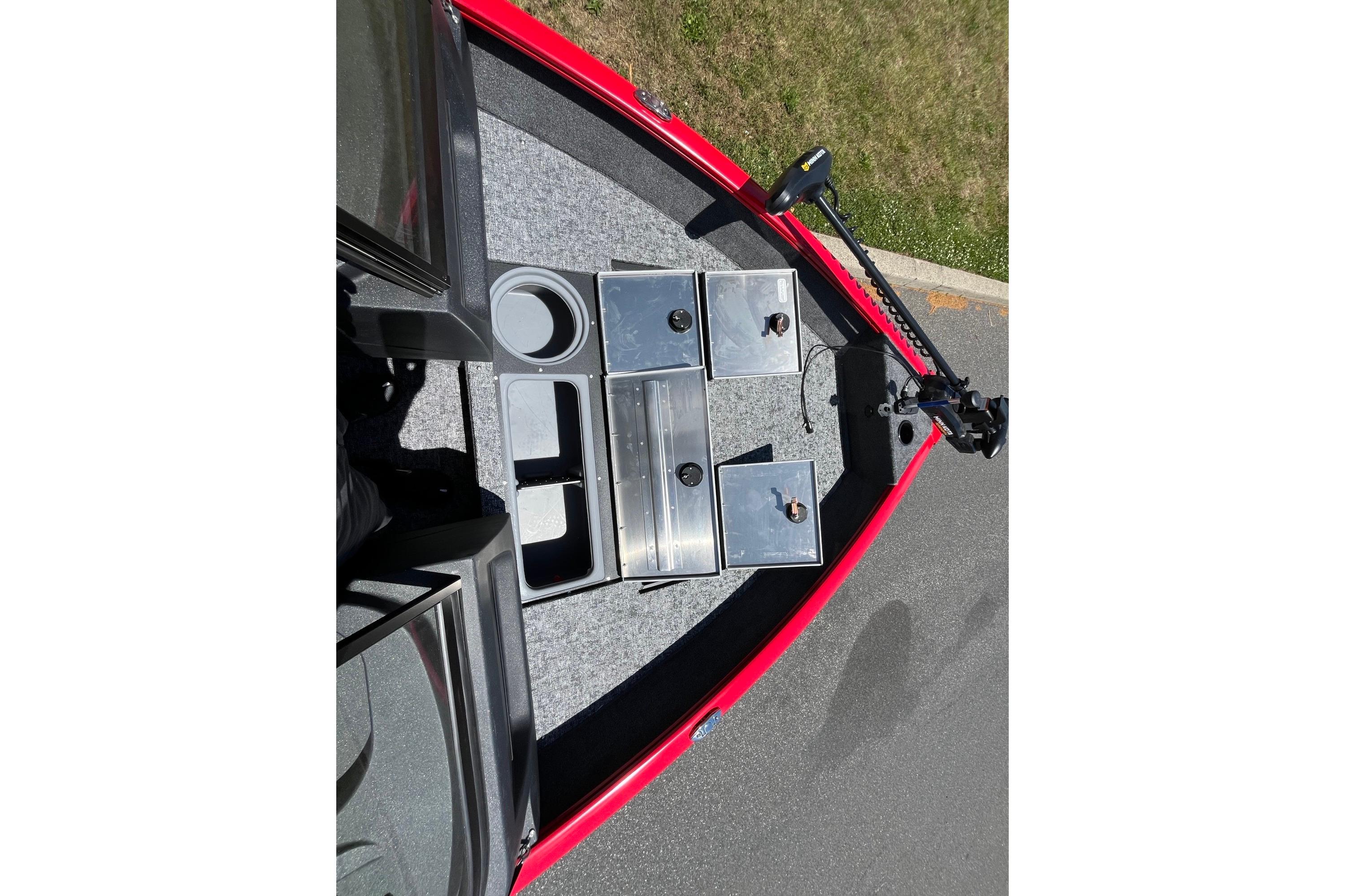 2026 Tracker Pro Guide V-16 WT boat interior with storage compartments and trolling motor.