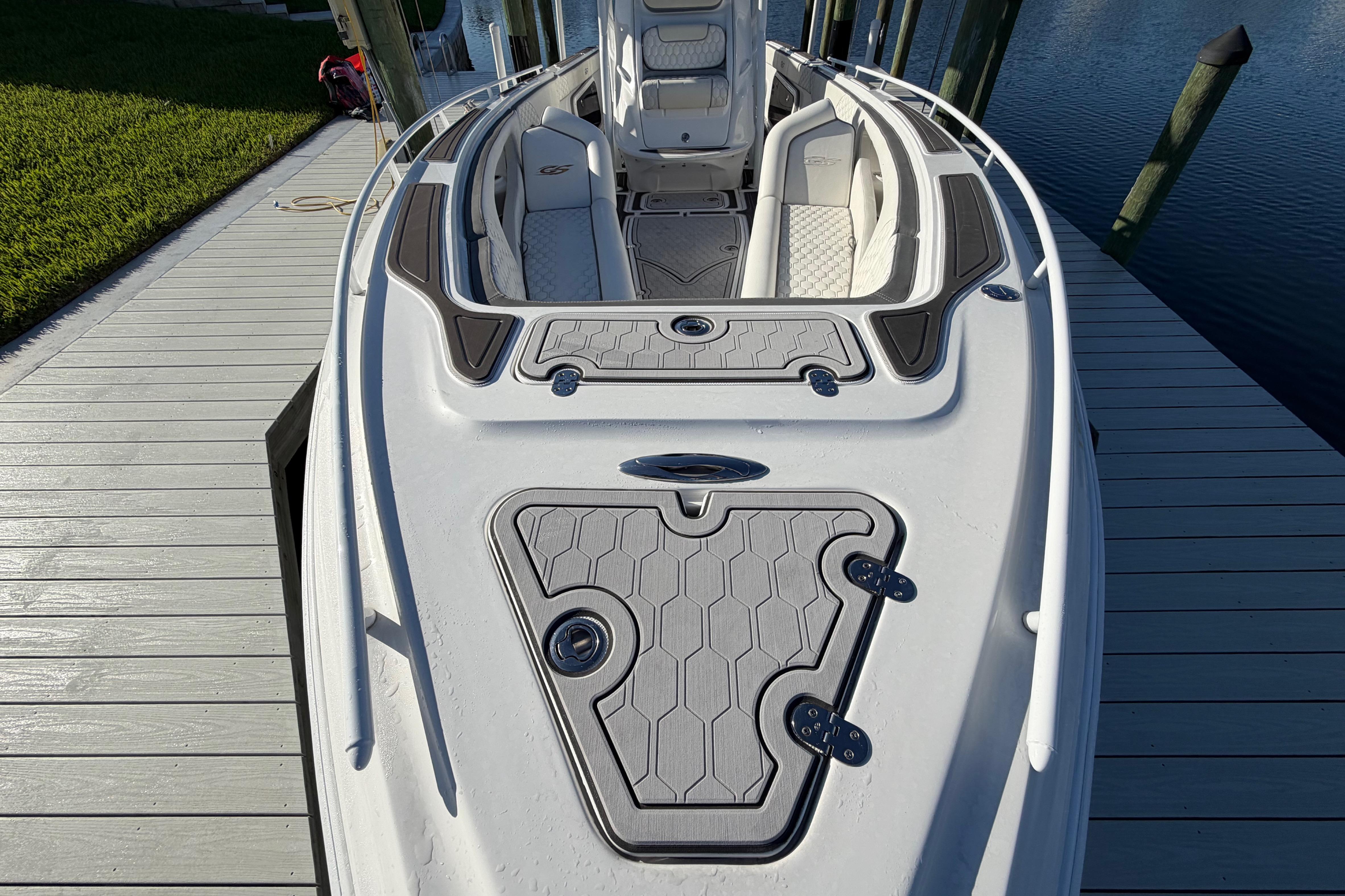 2022 Glasstream 328 Pro-XS boat docked, showcasing sleek design and spacious deck.