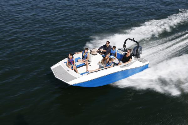2025 Starcraft SV 16 OB boat cruising on water with passengers enjoying the ride.