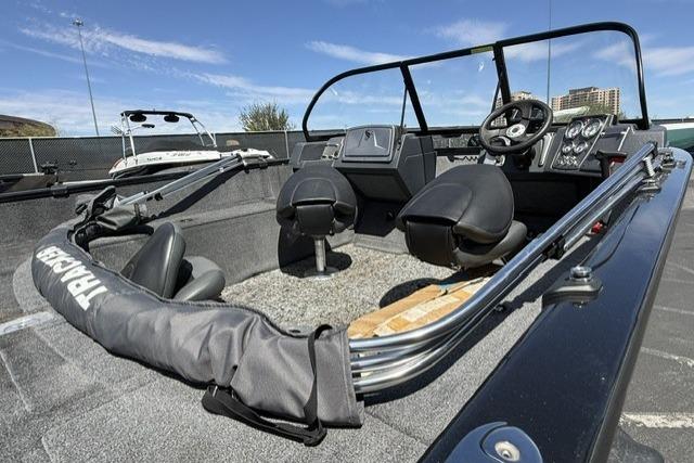 2025 Tracker Pro Guide V-175 WT boat interior with steering console and seating.