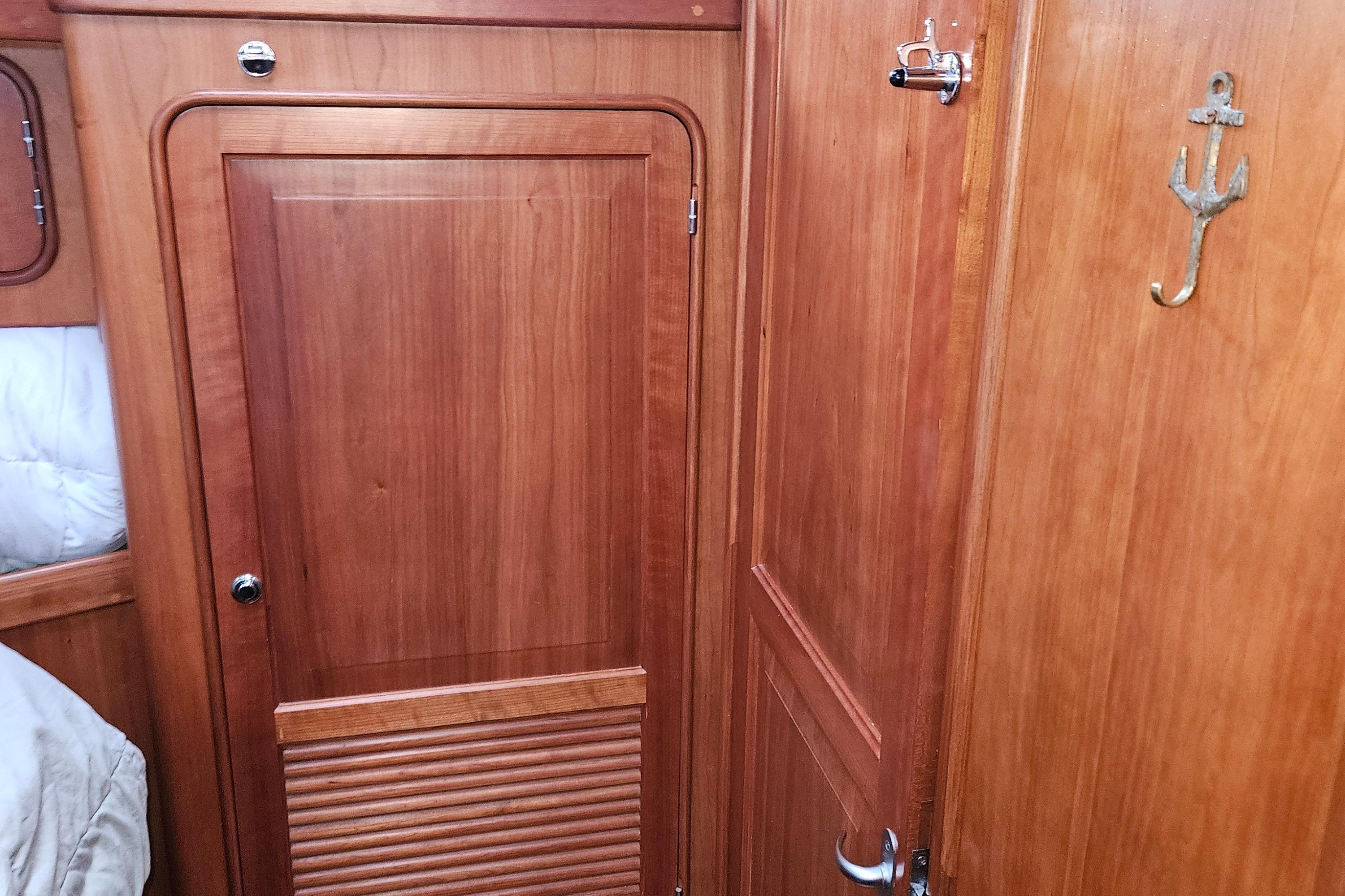 Wooden interior of 2013 Passport 470 Center Cockpit sailboat cabin.