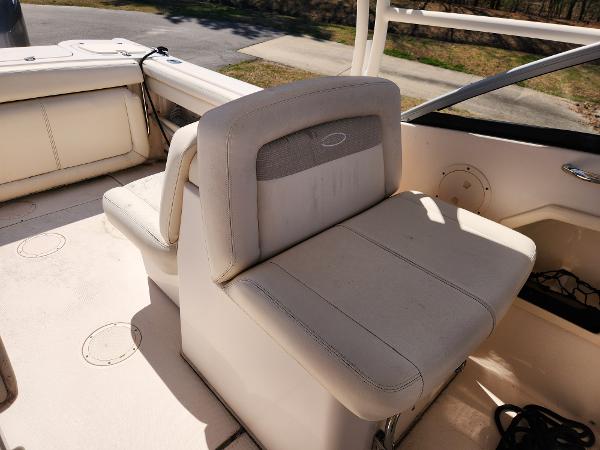 2015 Grady-White Freedom 275 boat interior with beige seating and deck view.