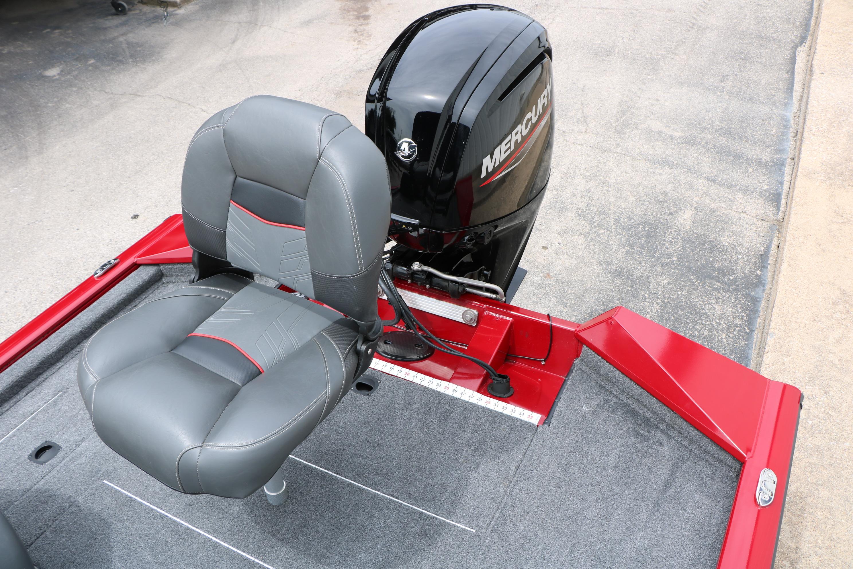 2024 Tracker Pro Team 175 boat with Mercury engine and gray seating.