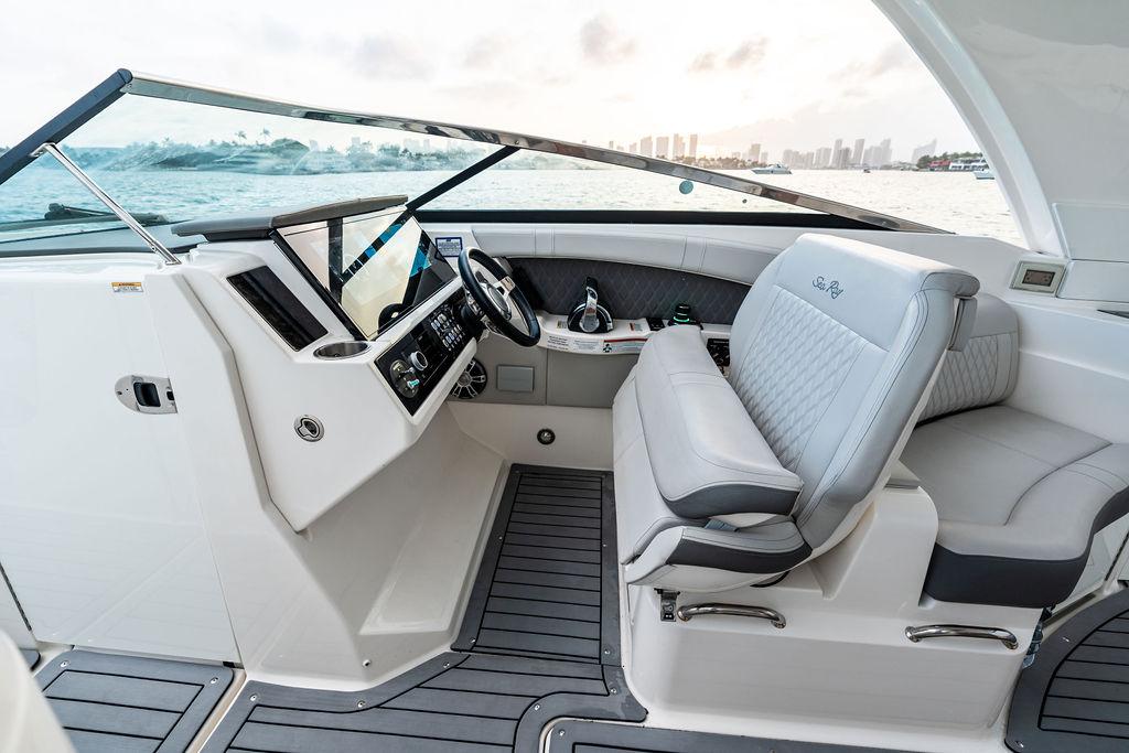 2021 Sea Ray 350 SLX OB boat interior with modern helm and seating.