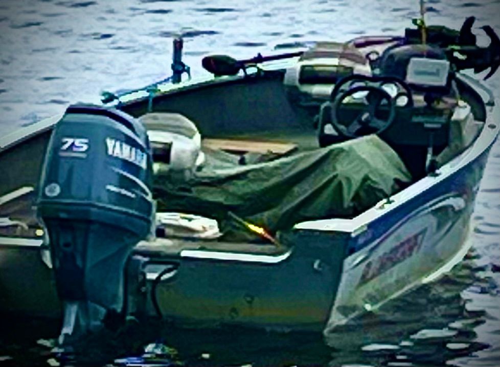 A 2005 Alumacraft Navigator 175CS on the water with a Yamaha outboard motor.