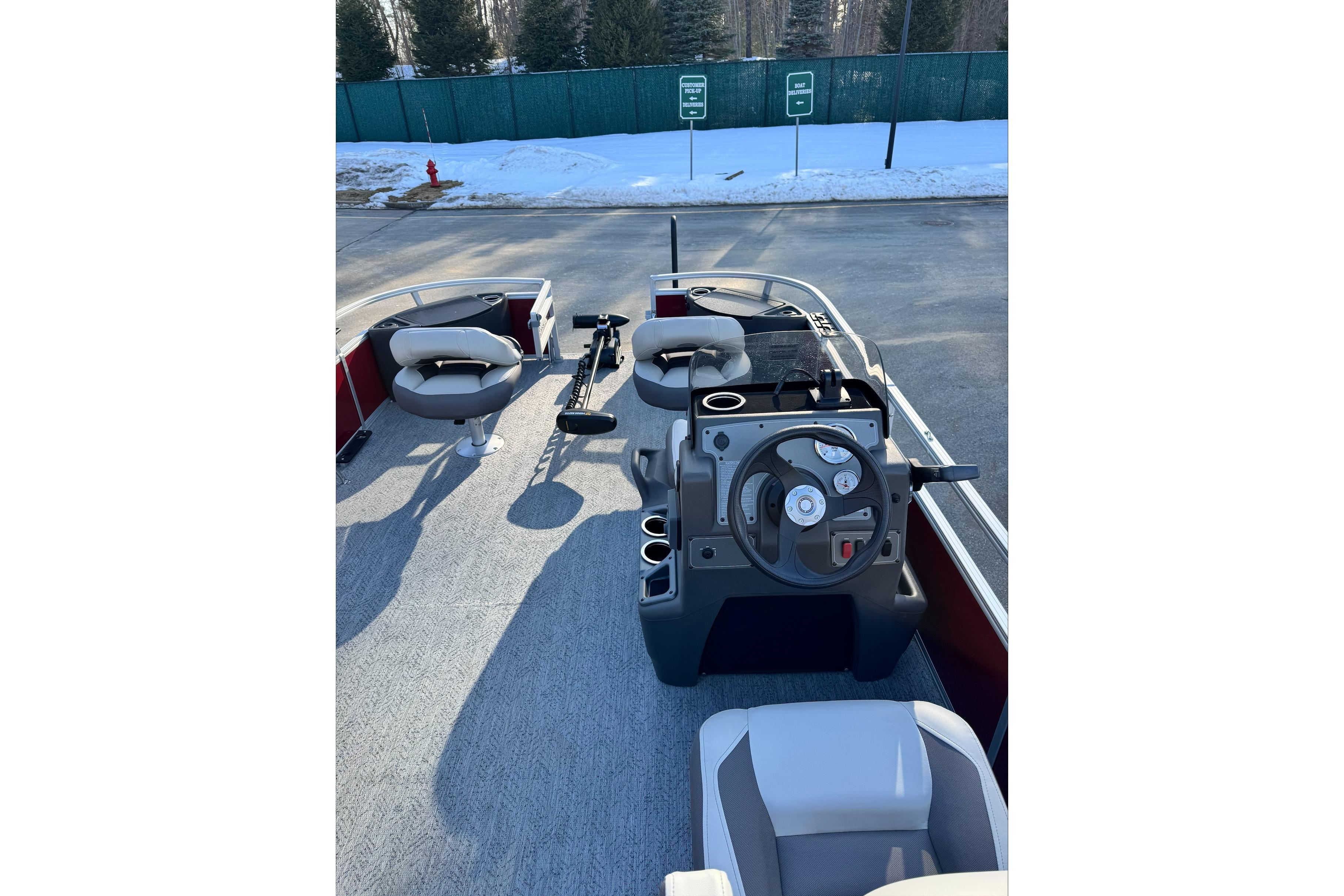 2026 Sun Tracker Bass Buggy 18 DLX interior with steering console and seating.