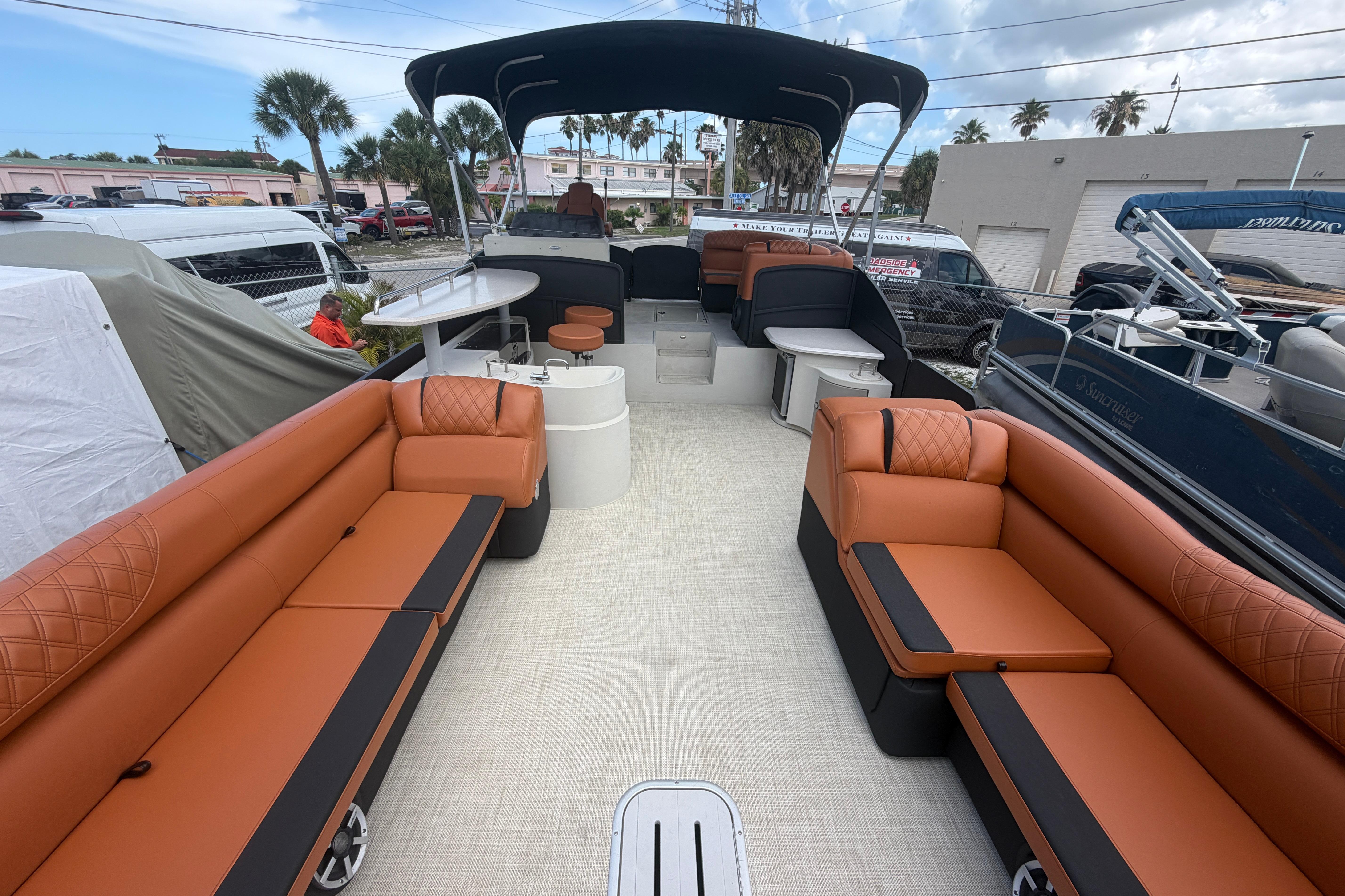 Luxurious 2015 Premier 290 Grand View pontoon boat with spacious seating and modern amenities.