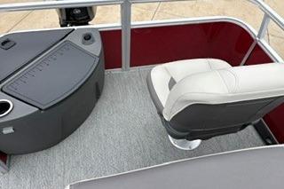 2026 Sun Tracker Bass Buggy 18 DLX interior with captain's chair and control panel.