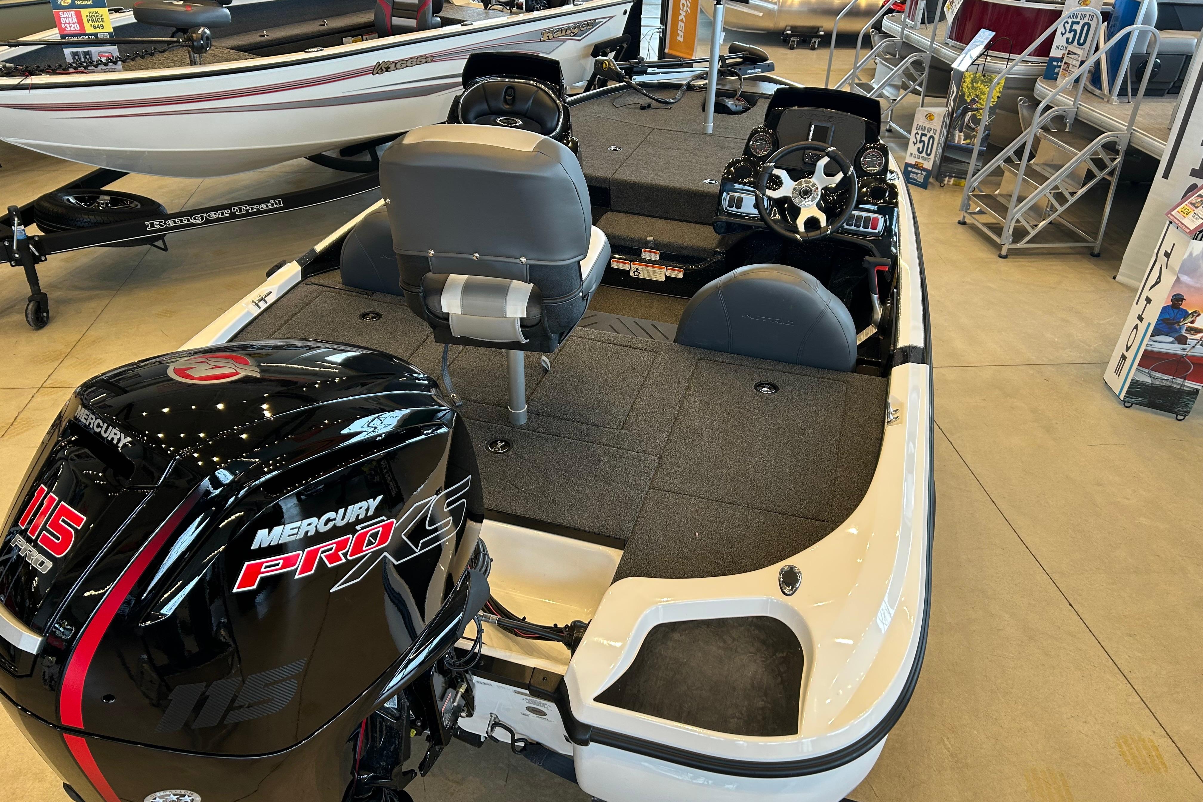 2026 Nitro Z17 boat with Mercury Pro XS 115 engine displayed in showroom.